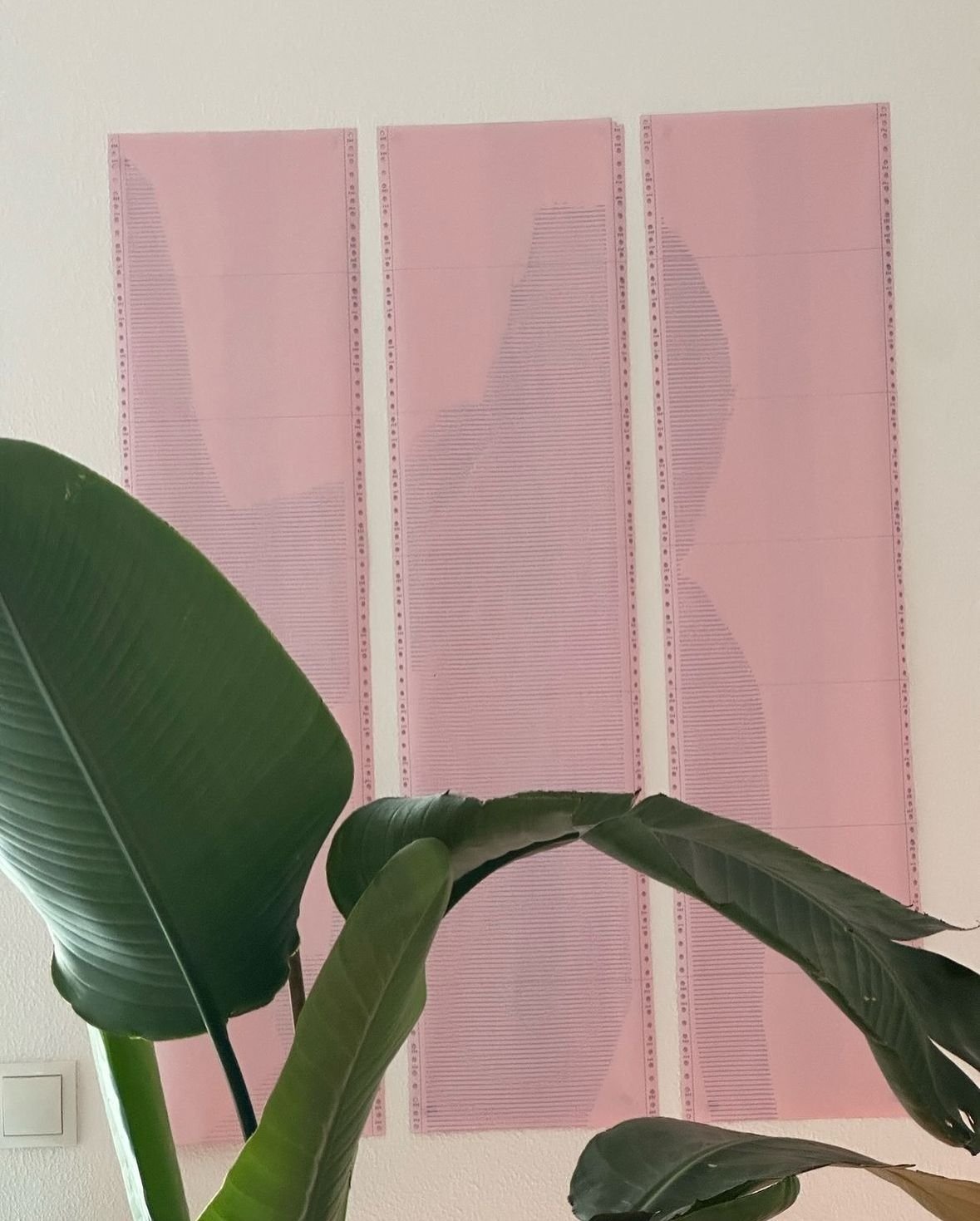 First iteration of this piece, slowly the definition comes out in the final installation piece. Three-sheet pink ASCII art print by Characters ASCII depicting a reclining nude male figure, hands caressing their face, printed on salvaged dot matrix co