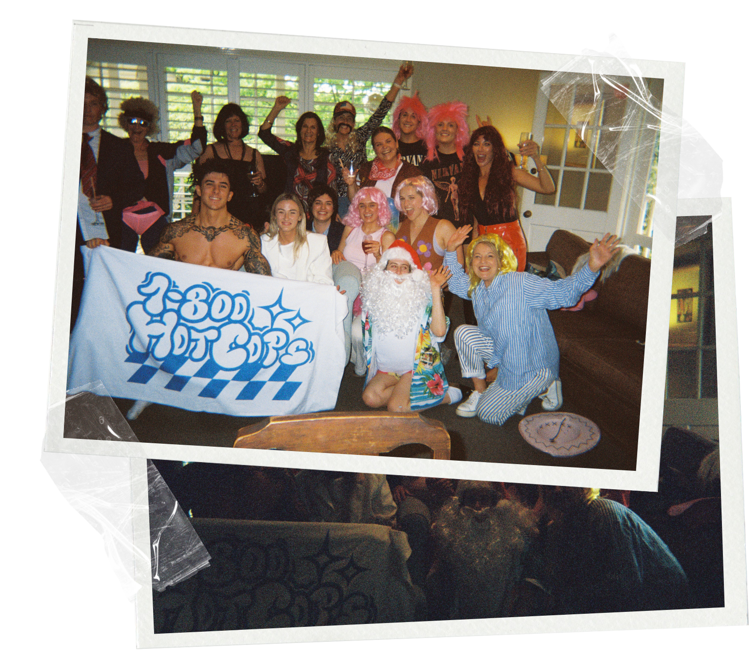 Hens party costume party with a 1-800 HOT COPS life drawing model posing for a group photo with the bride and her hens in the Gold Coast