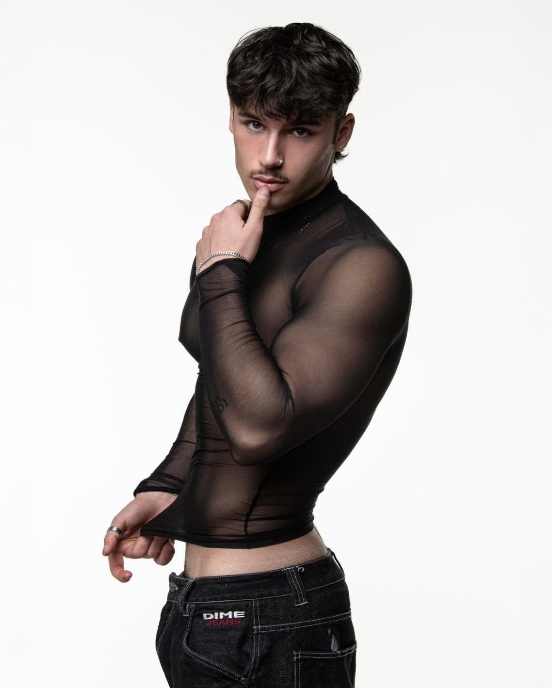 Joey Vegas studio portrait in a black long-sleeve top - male entertainer for Mornington Peninsula hens parties.