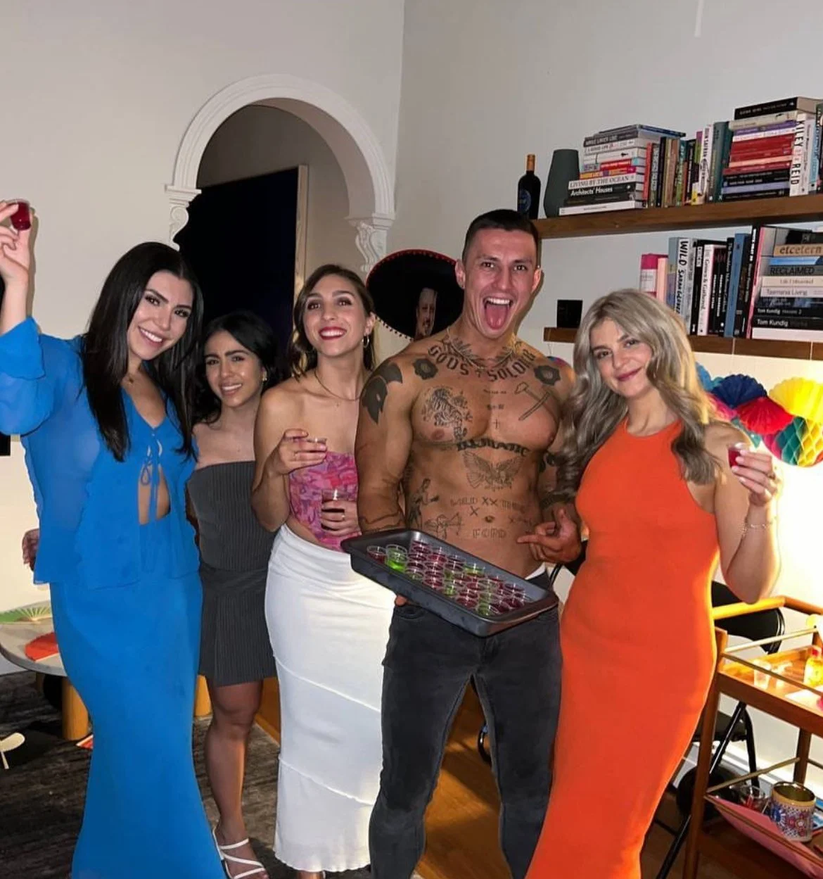Dirk Diggler group photo with happy ladies at a hens party in geelong -wild hens party performer for 1-800 HOT COPS.