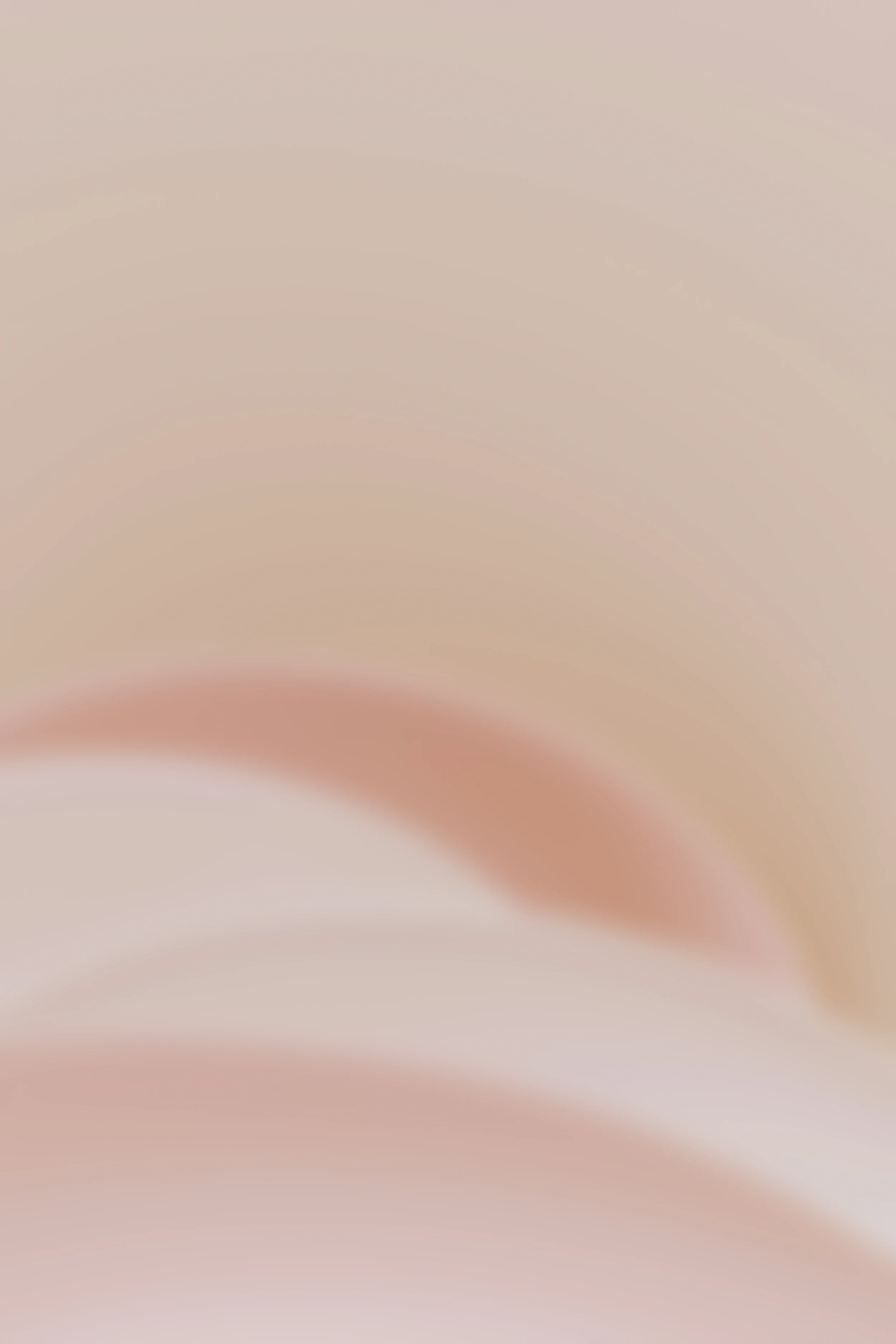 L'image montre un décor abstrait avec des tons de beige, blanc et rose clair, sans objets ou figures reconnaissables.