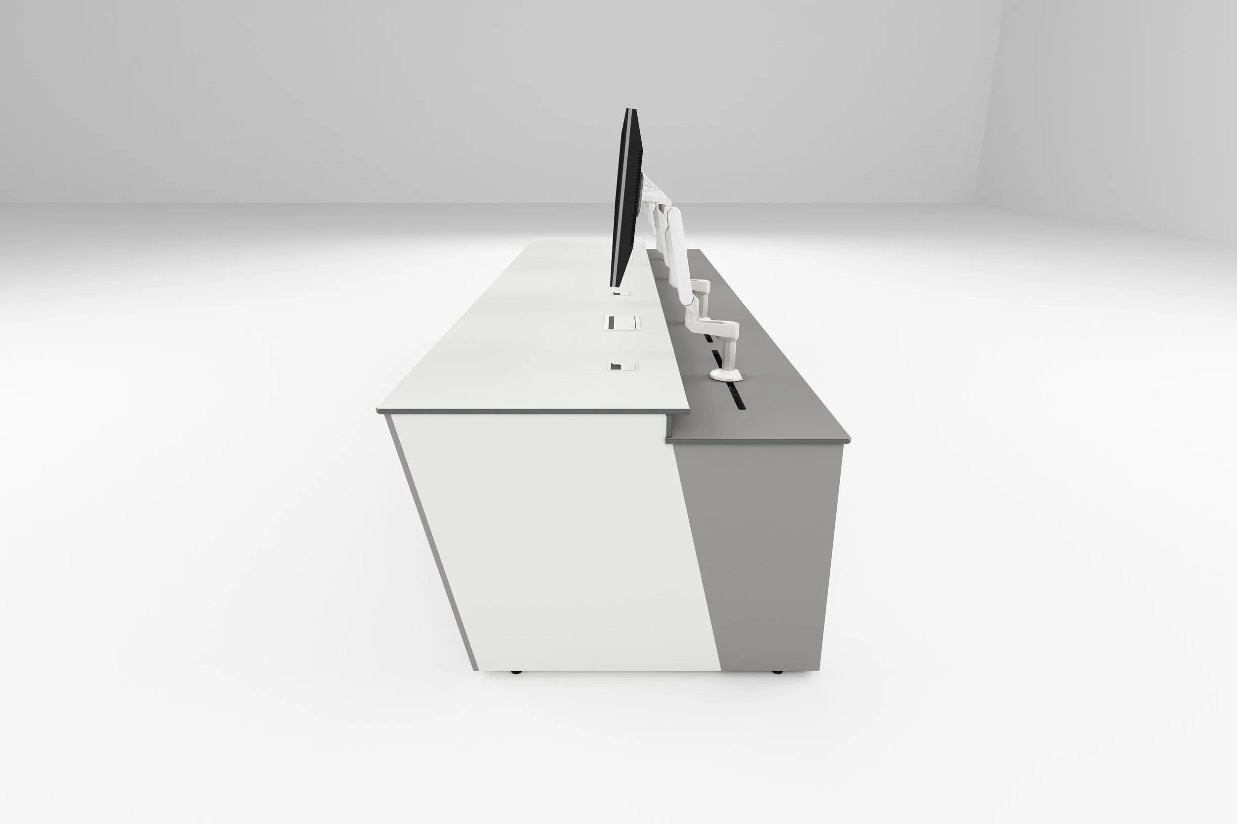 Office desk with a computer monitor and a robotic arm in a minimalist, white room.
