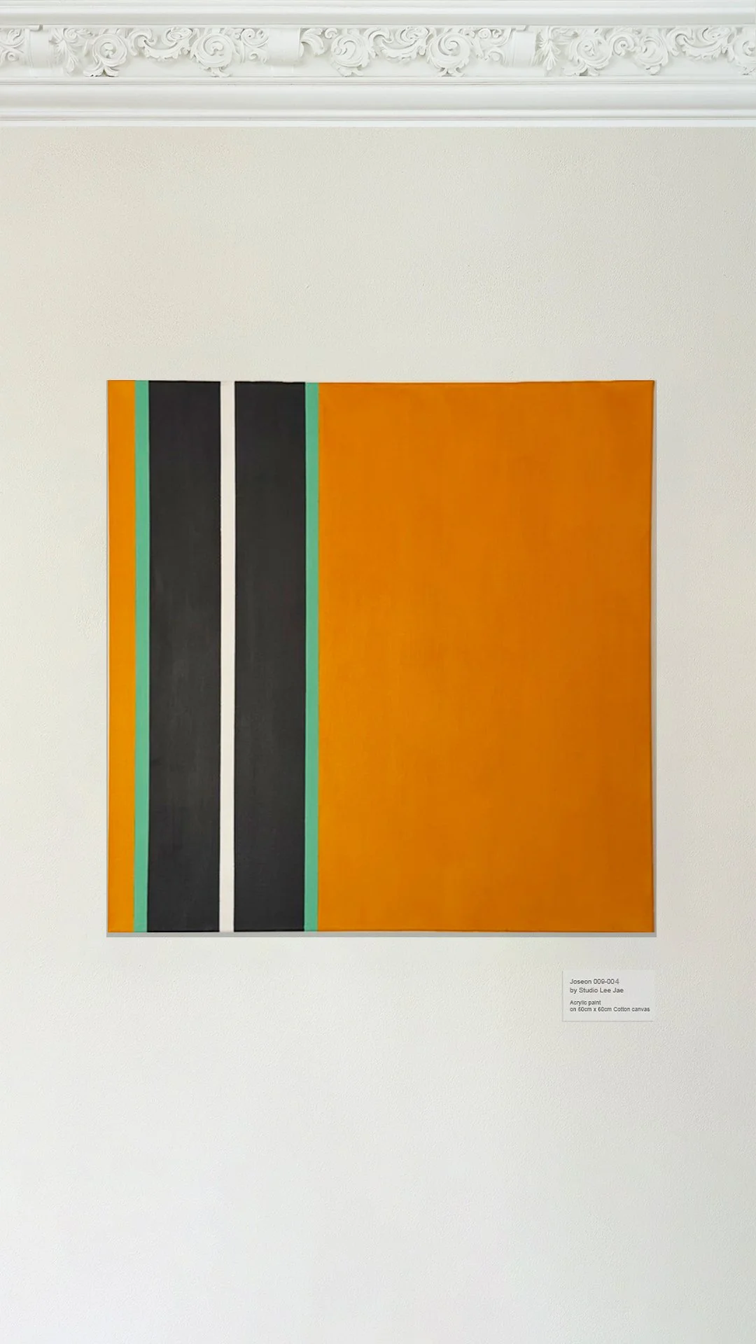 An abstract painting with bold black vertical stripes, turquoise lines on each side, and a large orange section, displayed on a gallery wall with ornate white crown molding.