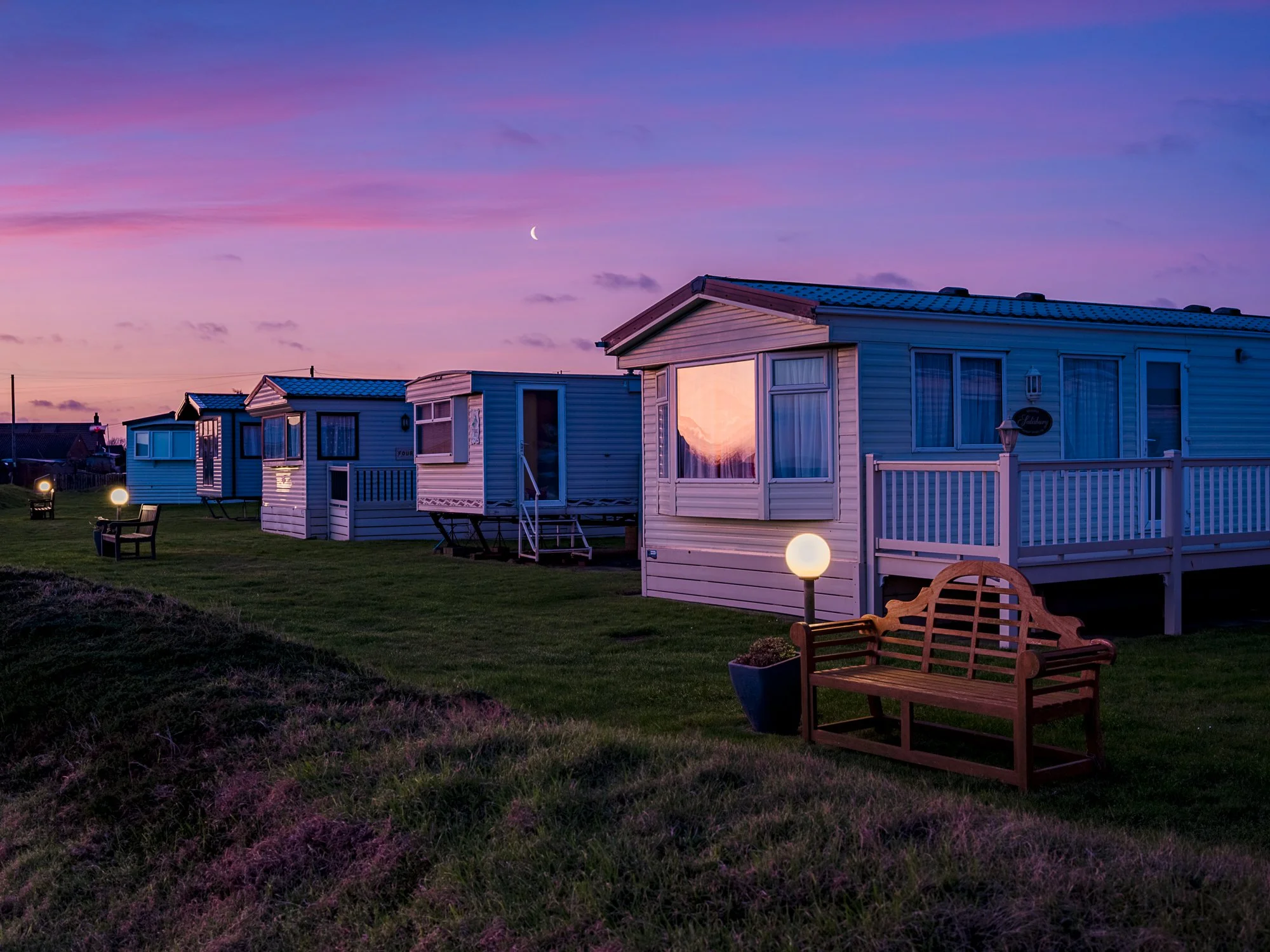 static caravans in the early morning light