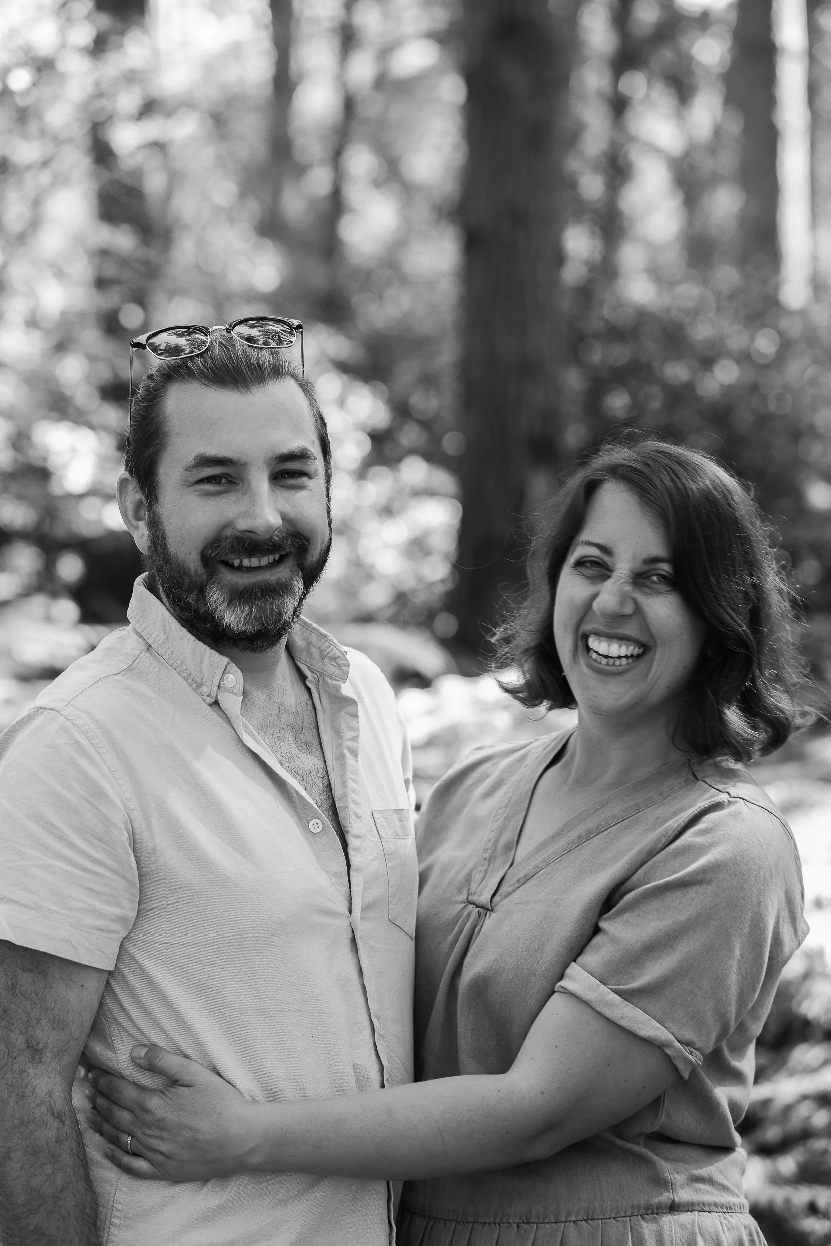 A happy couple smiling to the camera