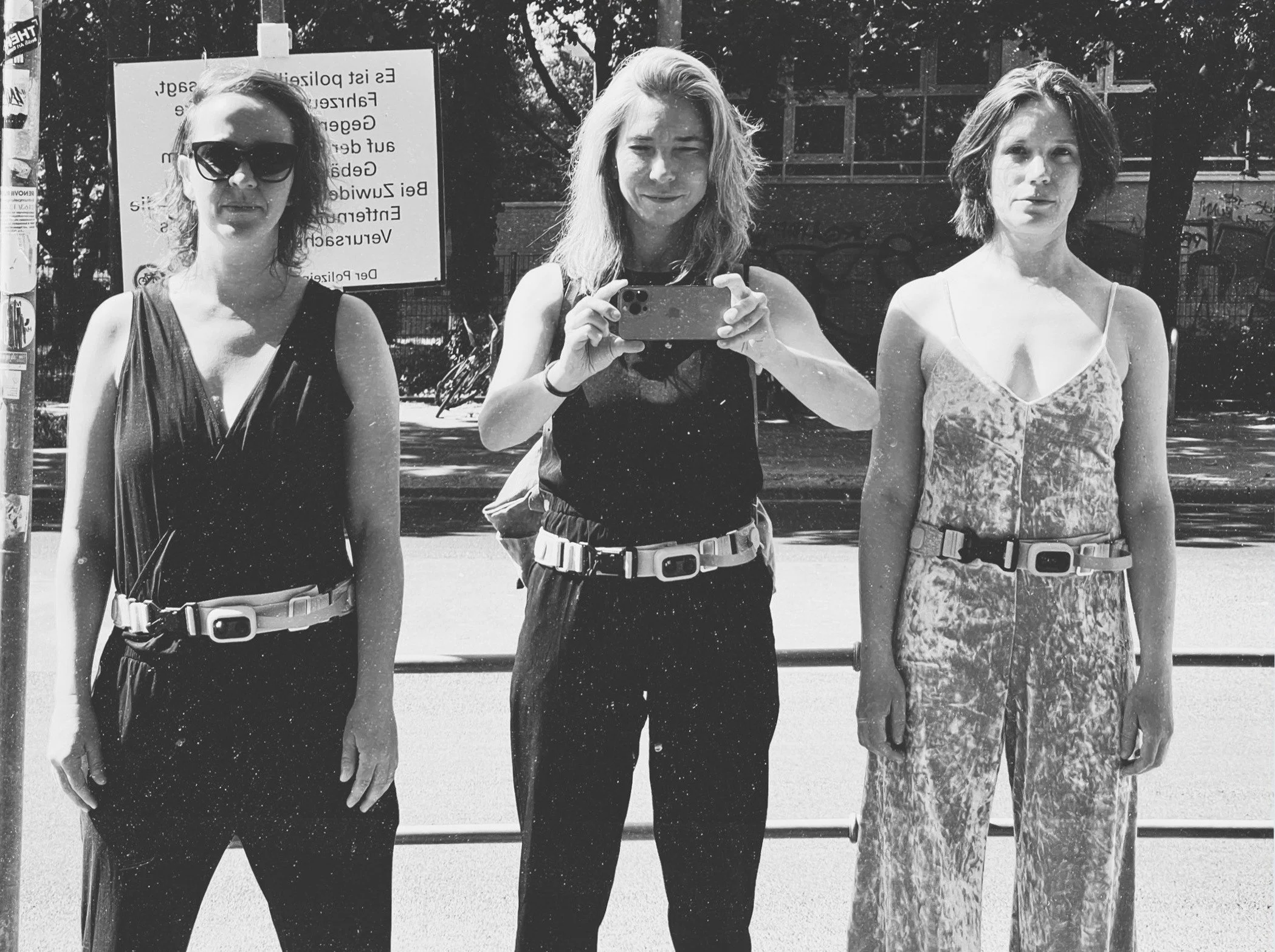 Marina Dessau and participants wearing haptic belts during an artistic research experiment on visual-to-tactile sensory substitution.
