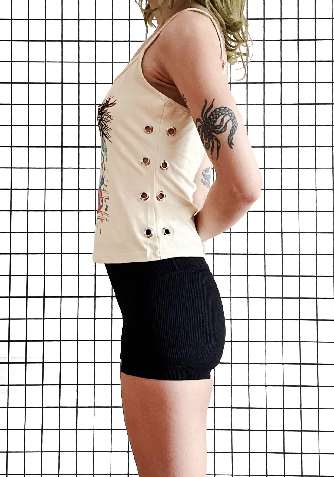 PeelingFlesh Angel Grommet Tank - Side 1.jpg