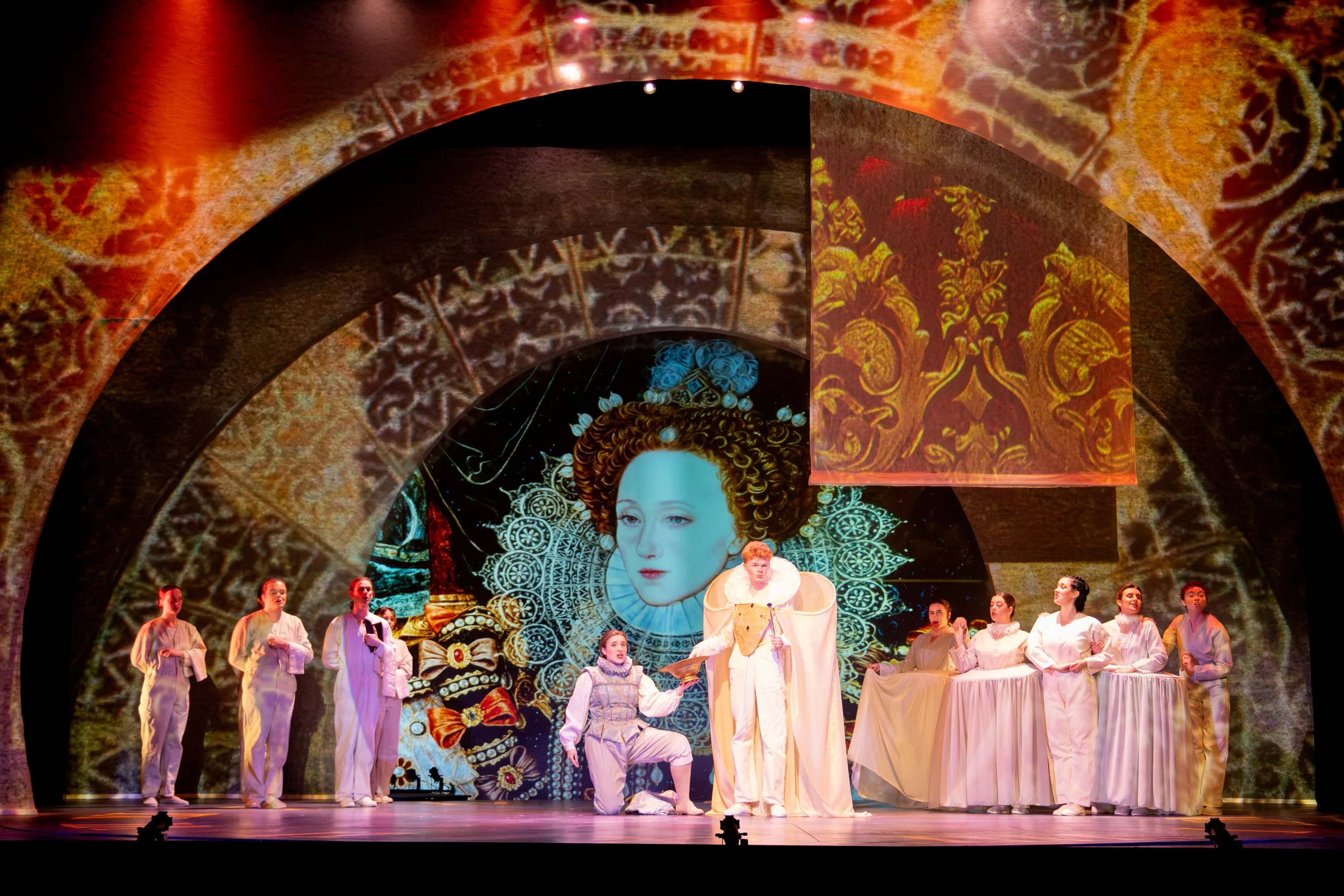 Orlando offers a bowl of rose water to the Queen. Orlando production photo. Photo by Maranda DeBusk.