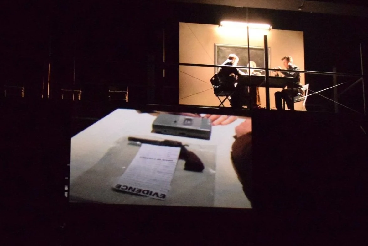 The murderer identifies his weapon. Production photo from Execution of Justice.