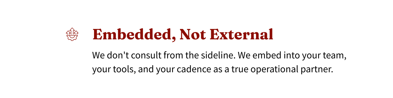 Text on a webpage that says "Embedded, Not External" in bold red font, with a small icon of a box with arrows pointing outward, and a paragraph explaining they don't consult from the sideline but embed into your team, tools, and cadence as an operational partner.
