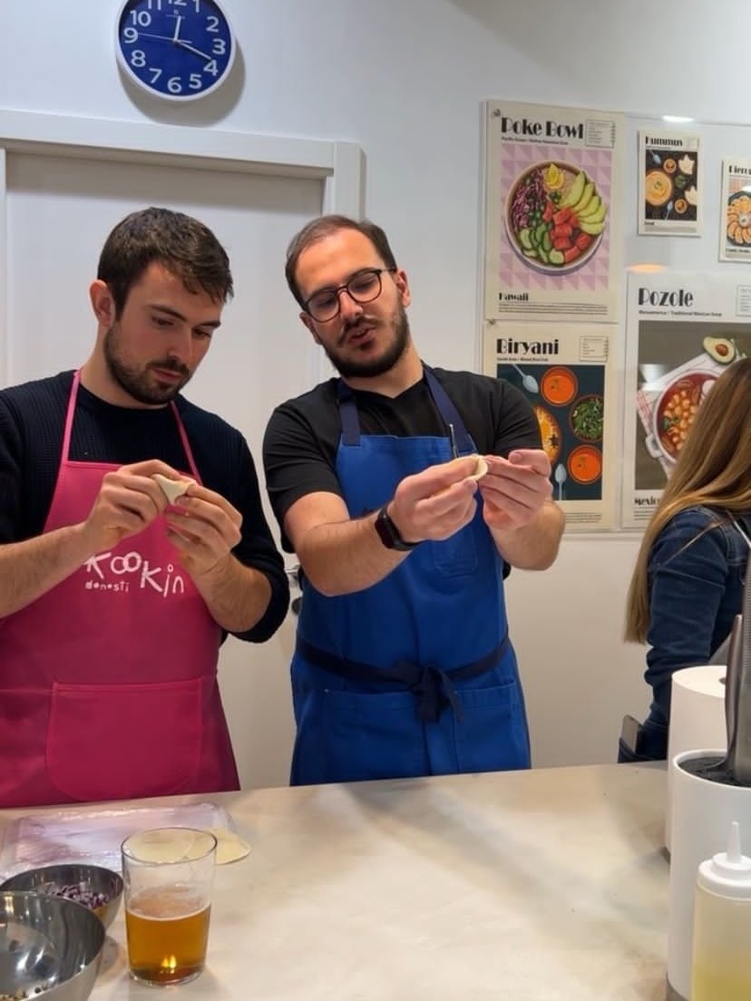 Carlos explaining how to make folds in gyoza class