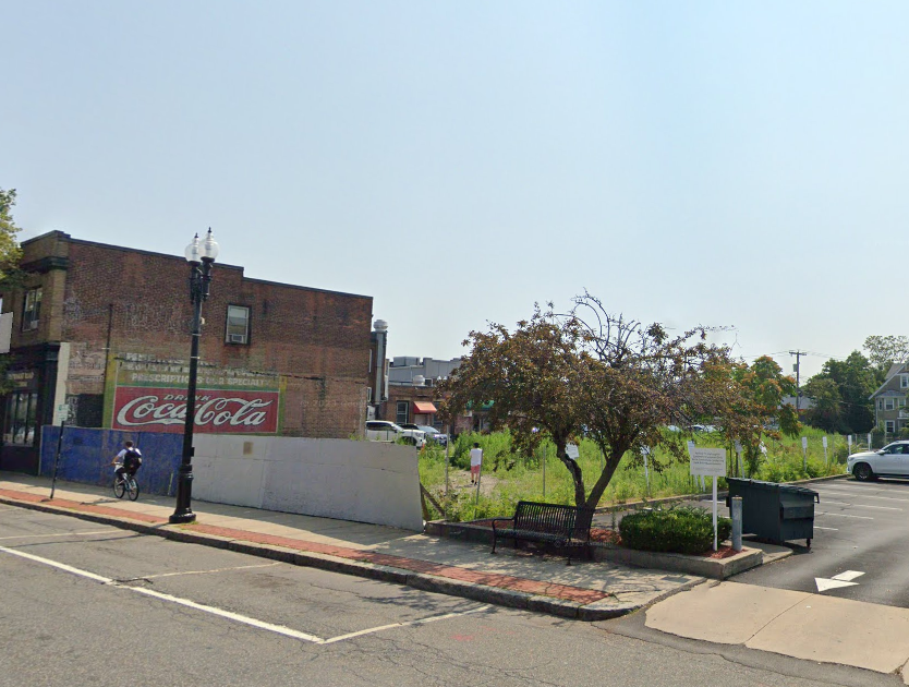 Google Maps image of empty lot behind fencing on Beale Street