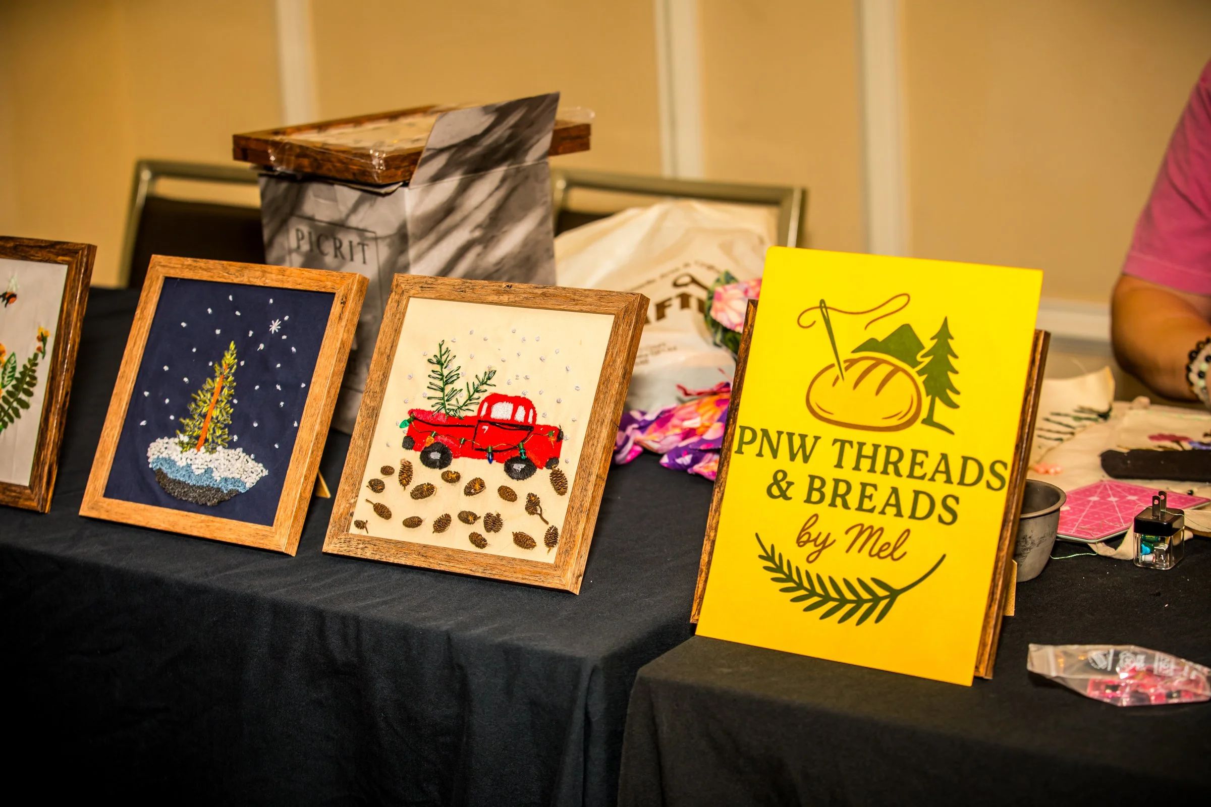 PNW Threads and Breads' vendor display PC Gabriel (Picture Perfect Visions)