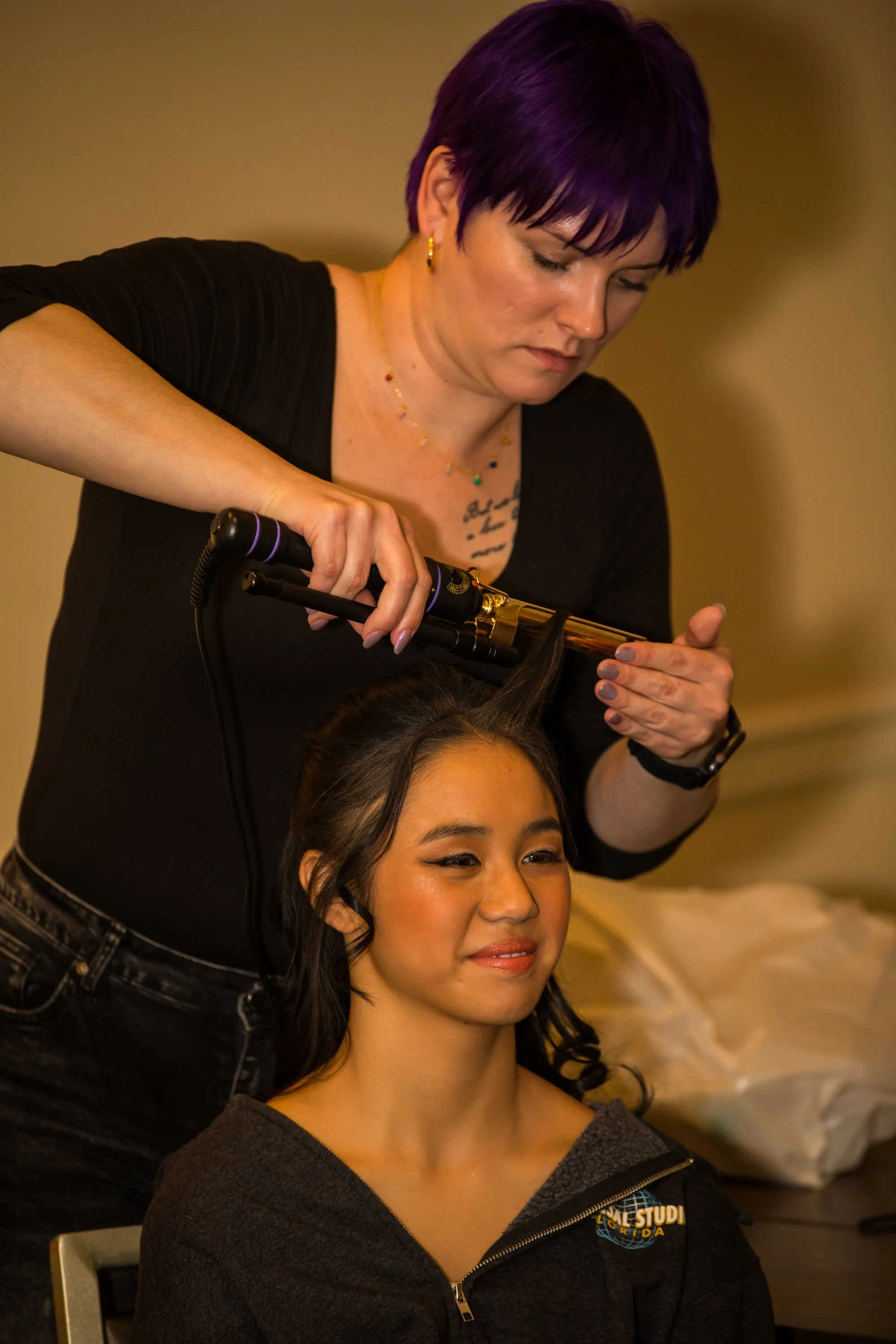 Hair and makeup team work to prepare the models for the runway PC Gabriel (Picture Perfect Visions)