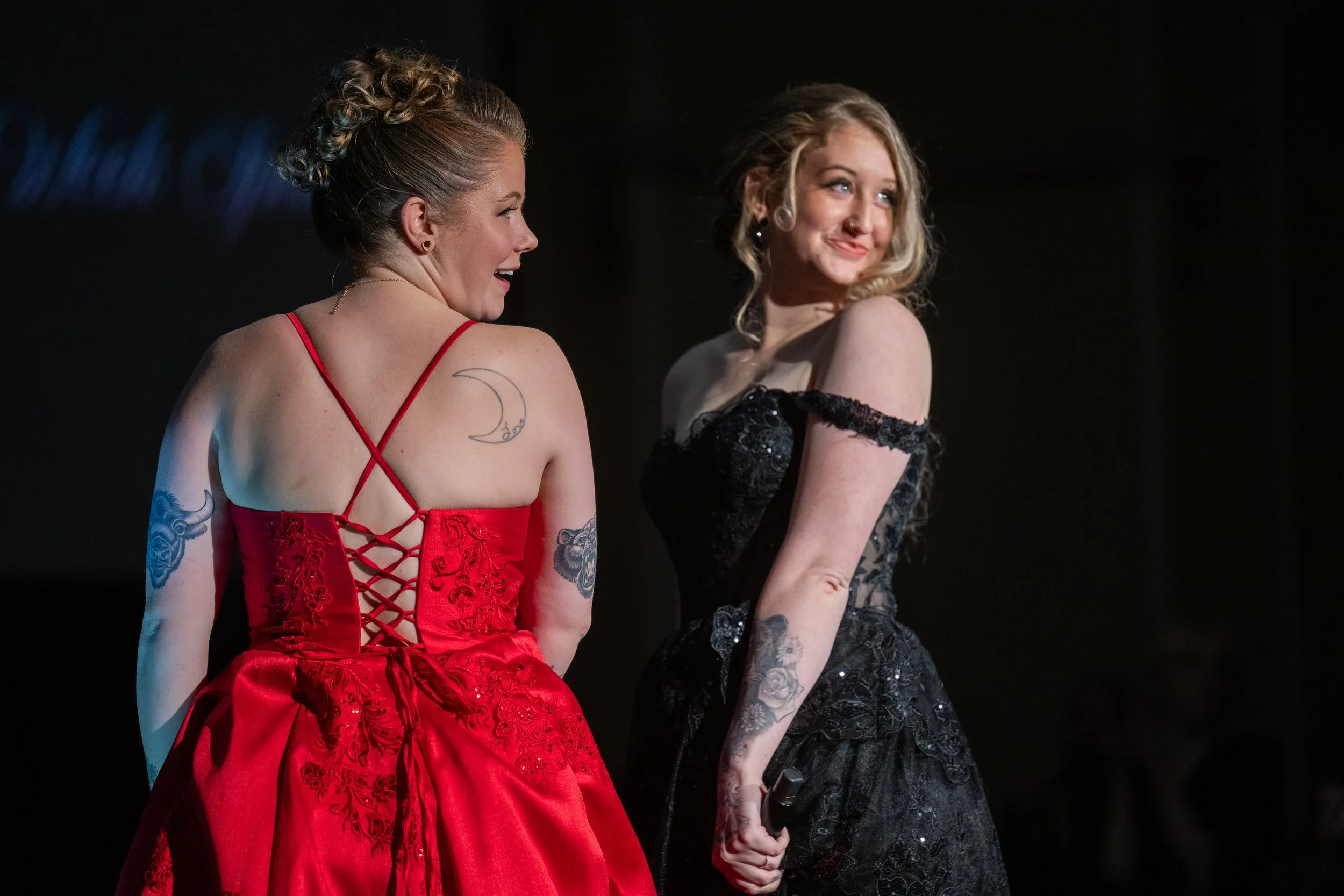 Mackenzie and Sophia take a bow on the runway. Featuring dresses and styling by Believe Prom