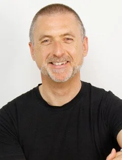 Smiling man in black t-shirt