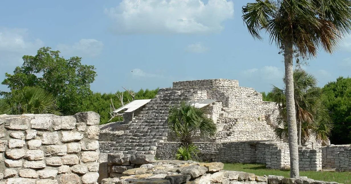 Xcambó Mayan ruins near the coast of Yucatán Mexico with surrounding vegetation