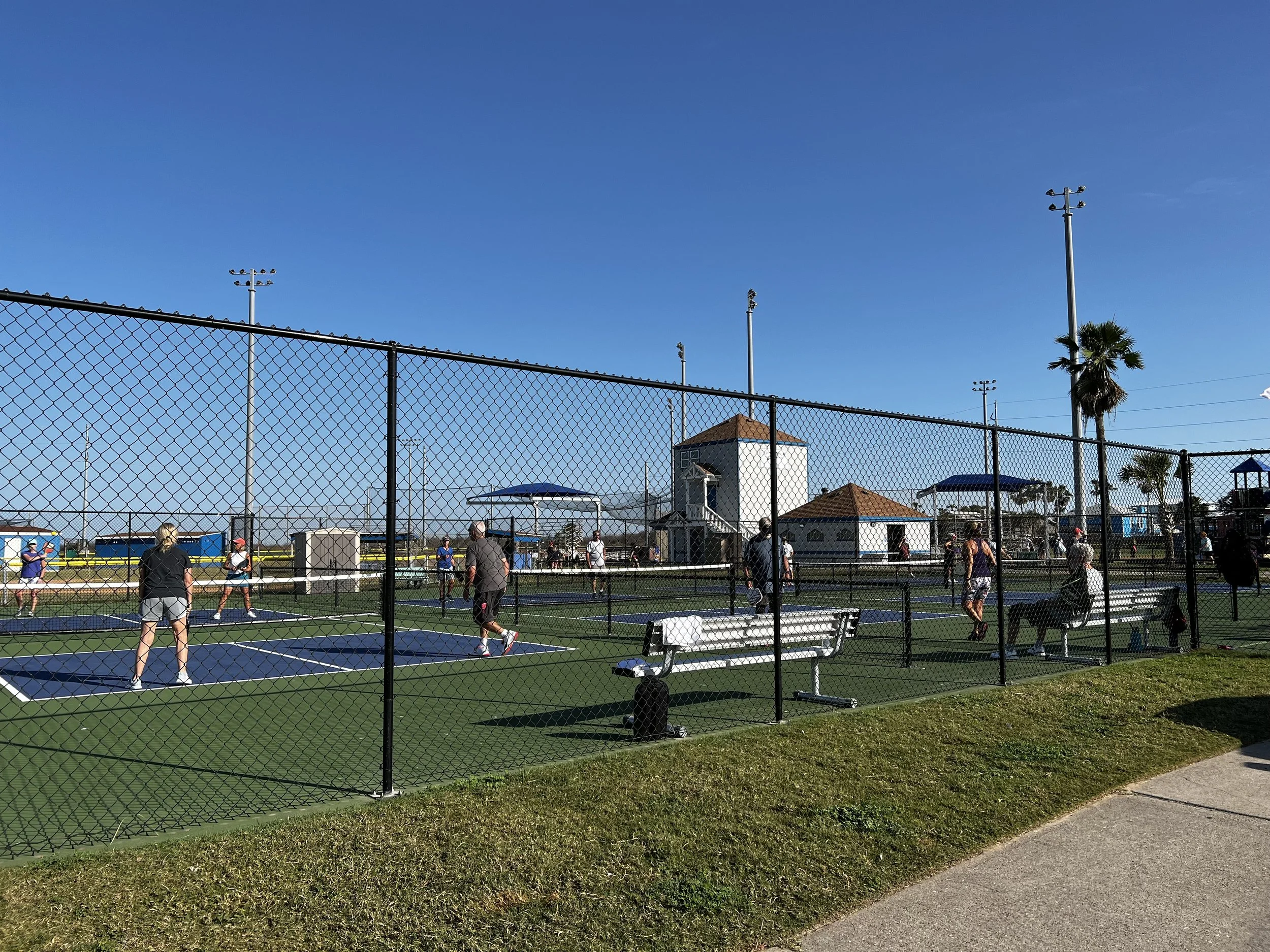 Five dedicated pickleball courts at Port Aransas Community Park, open to the public and free to use