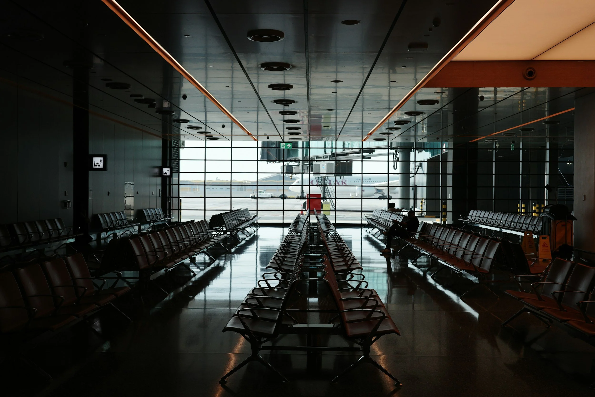 Empty airport terminal seating area reflecting travel disruption, airline instability, and operational uncertainty following carrier financial collapse.