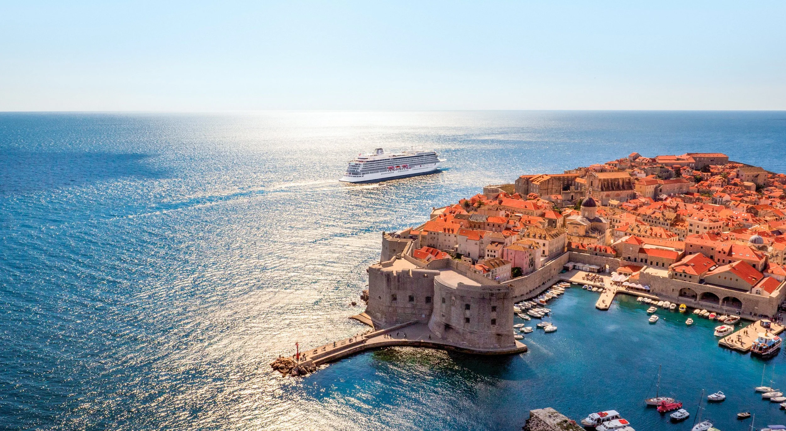 Viking Ocean ship sailing near Dubrovnik’s Old Town along the Adriatic coast