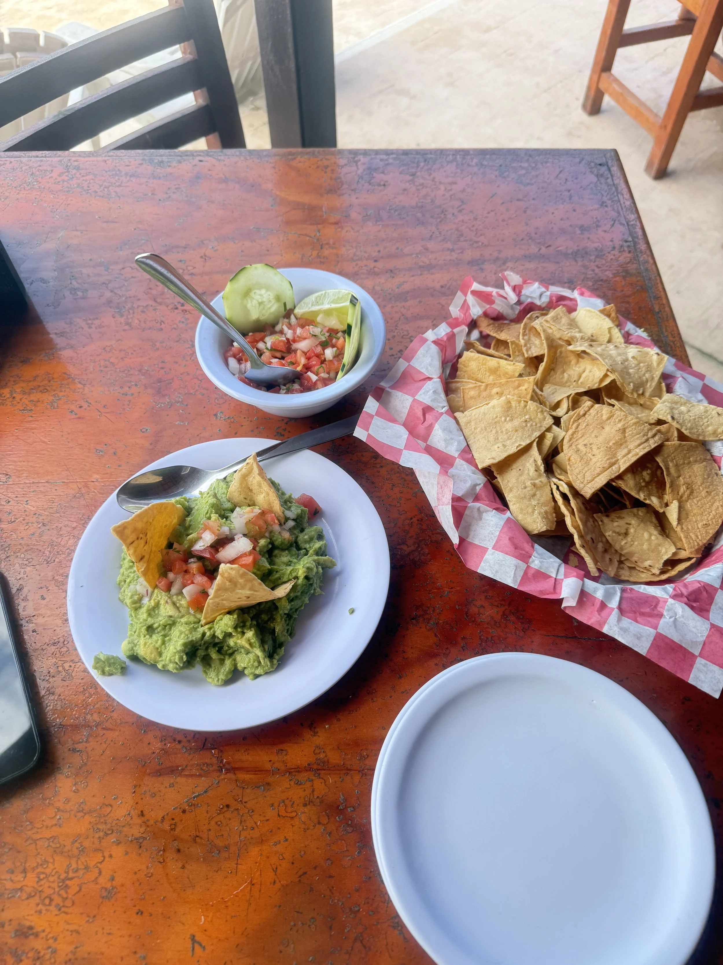 Fresh guacamole served with tortilla chips and pico de gallo at Islands Beach Club in Cozumel.