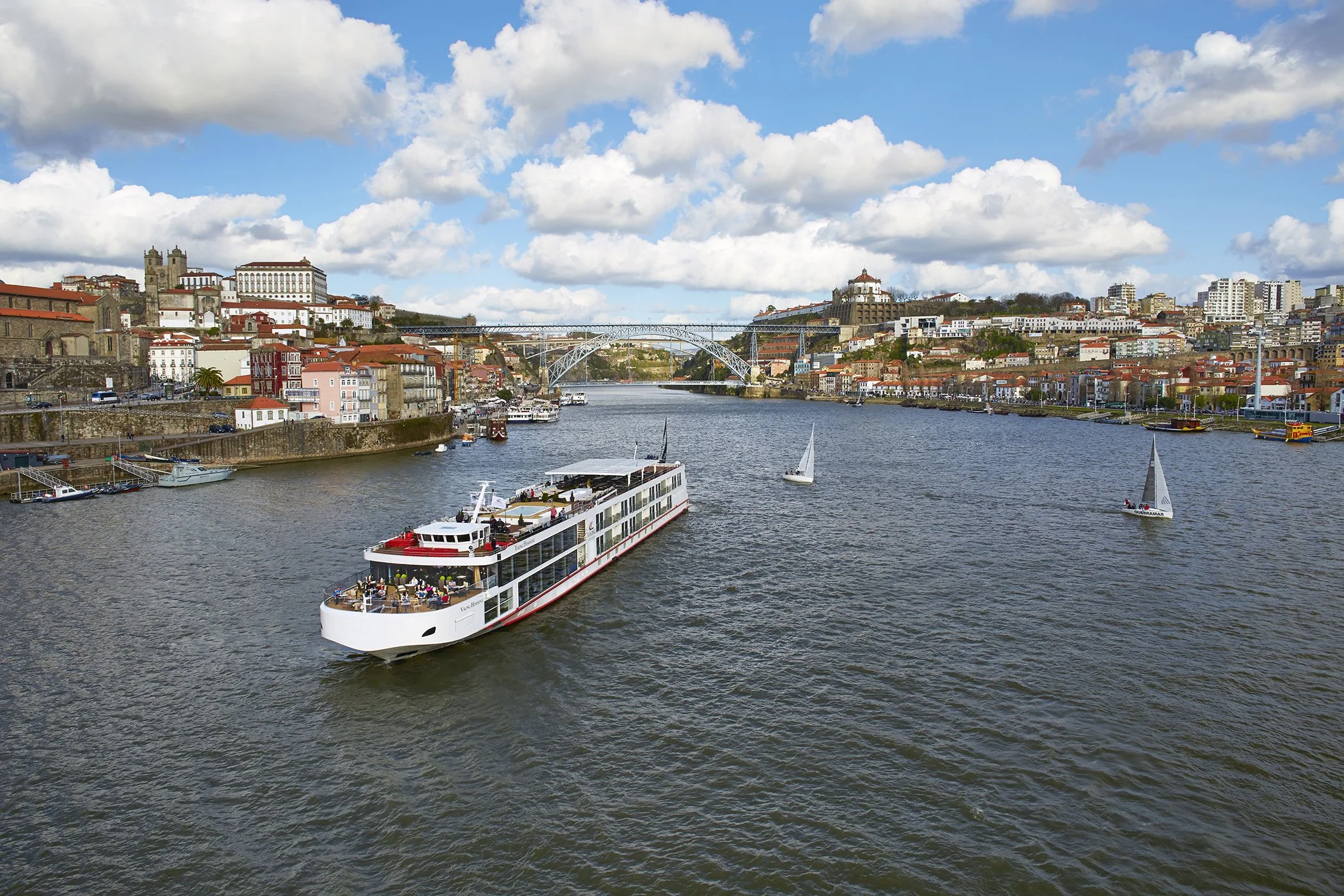 Viking River cruise ship sailing on the Douro River past Porto, Portugal