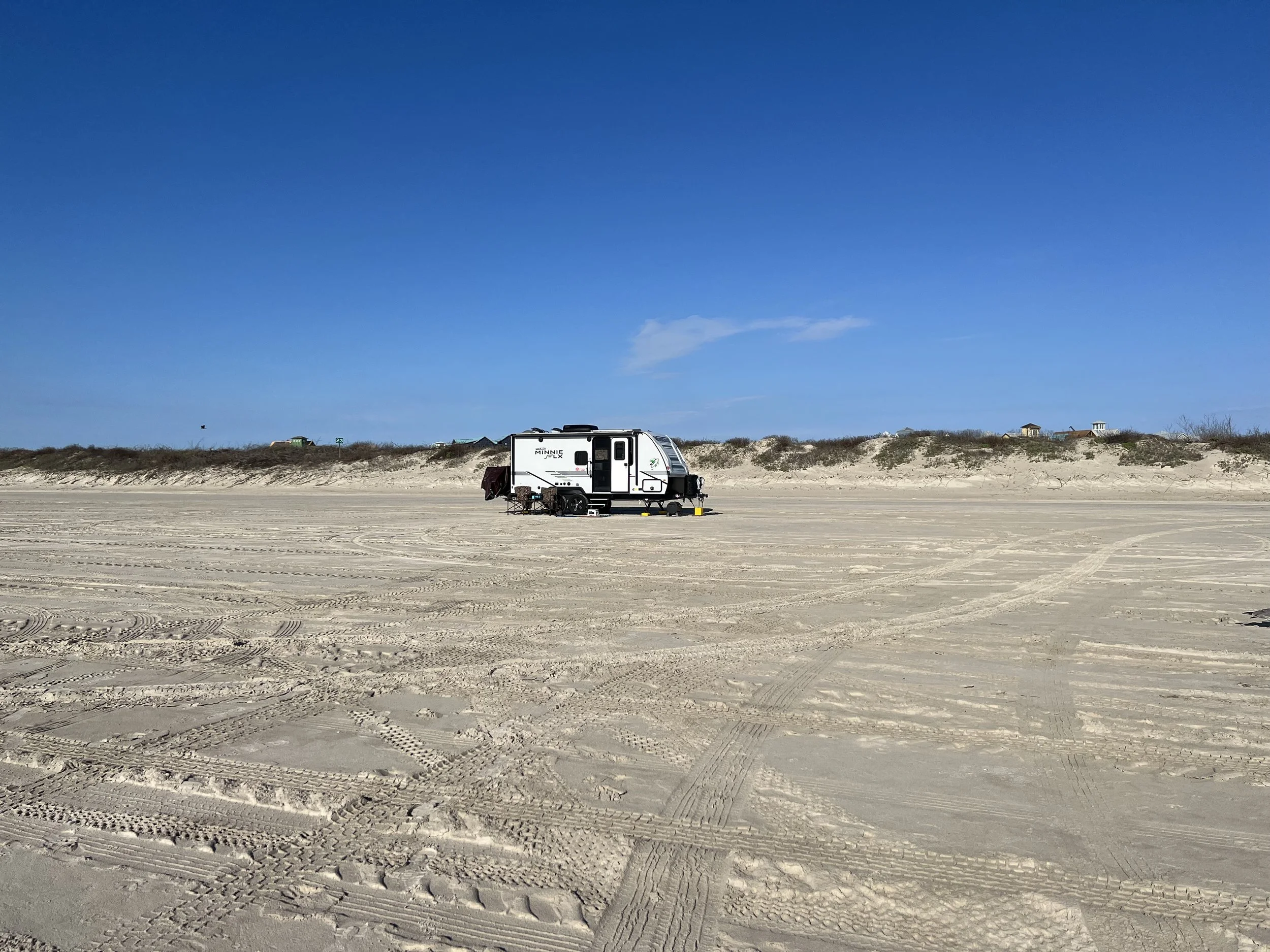 The Sea Seeker camper trailer parked near the dunes in Port Aransas on Memorial Day weekend.