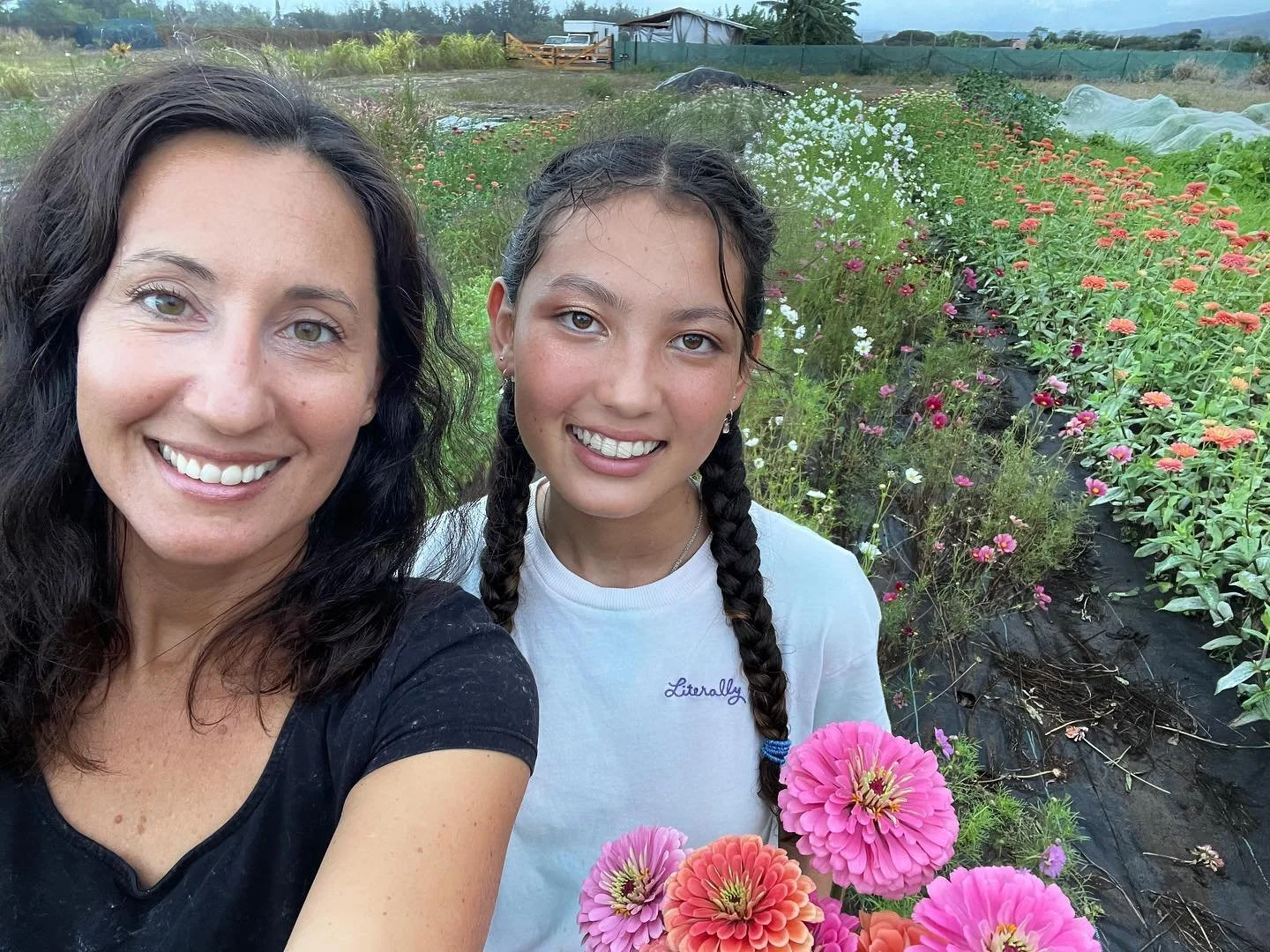 I&rsquo;m Tara and this is my daughter Belle. We own a small-scale flower farm in Mokuleia on the North Shore Of Oahu.  This is our second year growing flowers. Our field is bursting with zinnias, cosmos and lots of other beautiful blooms. Send us a 
