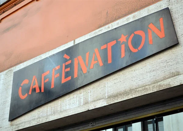 Caffenation_sign_2003_600x600.webp