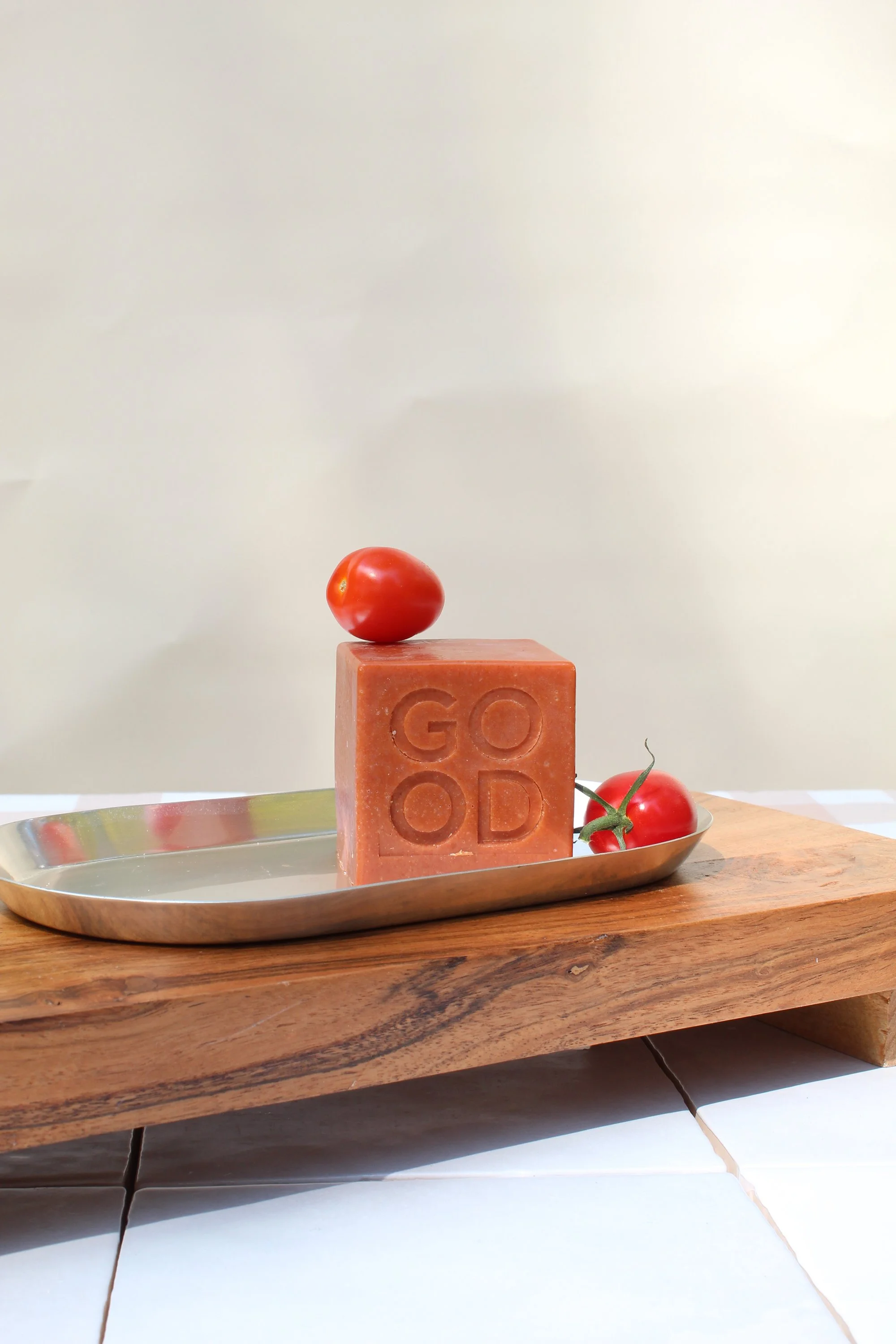 Good_Rhubarb_The_Tomato_Bar_soap_with_two_tomatoes_steel_soap_tray.jpg