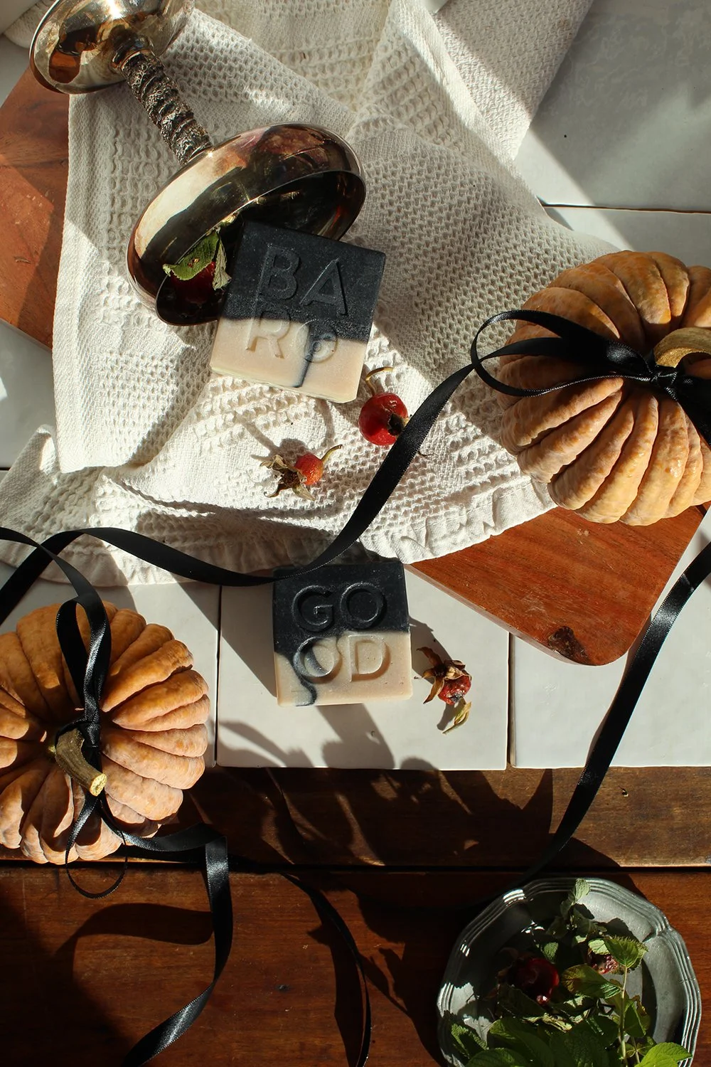 GR_Ghostwood_Silver_cups_rosehips_ribbon_pumpkins_Flatlay-1.jpg