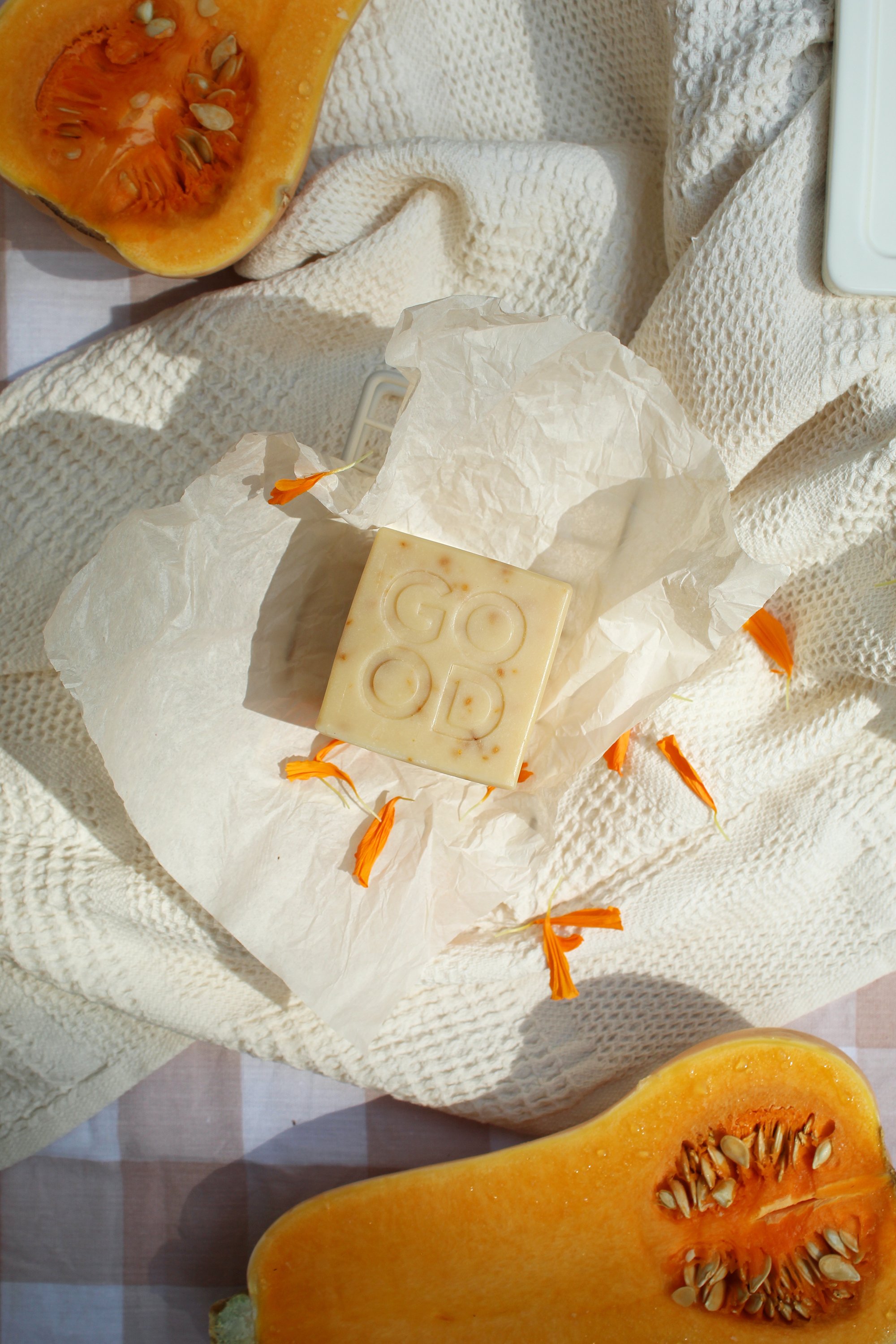 Good_Rhubarb_Marigold_Butternut_Soap_Flatlay_w_Squash_Flowers_waffle_Linens.jpeg