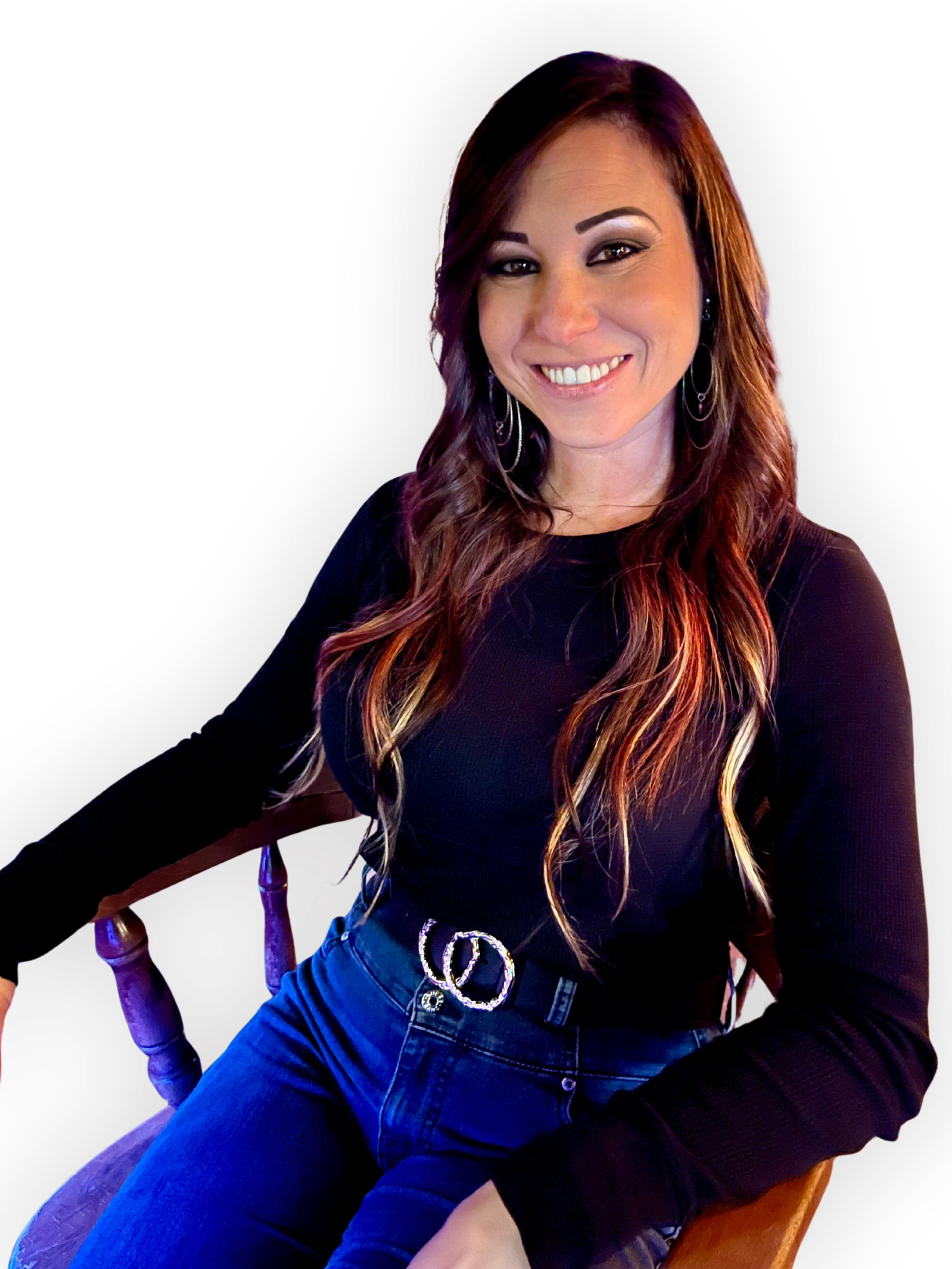 Kelleigh Gamble, founder of Branca Theory, sitting in a chair with a calm and confident expression