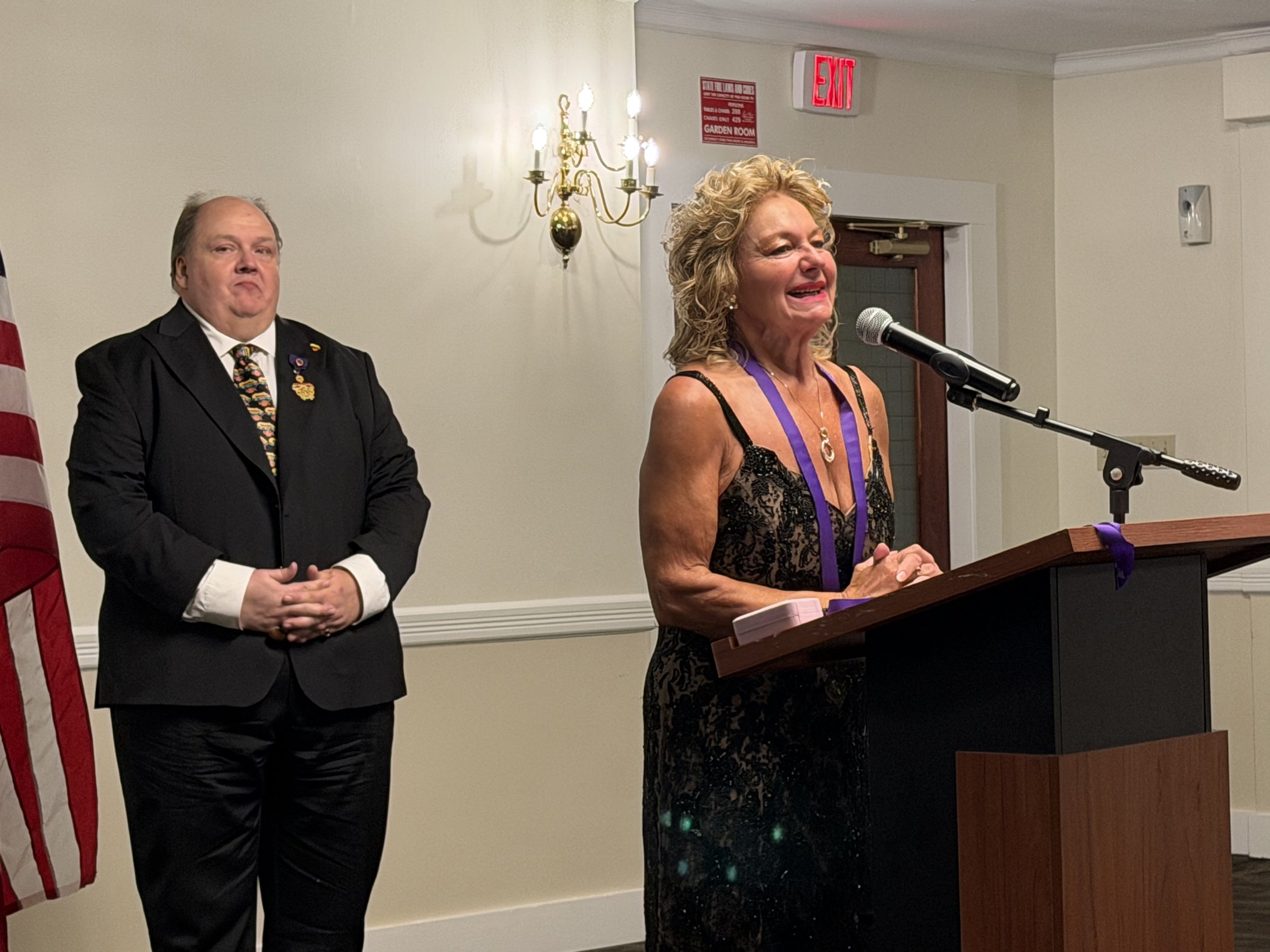 Maryte Bizinkauskas, national  president receiving her honorary membership