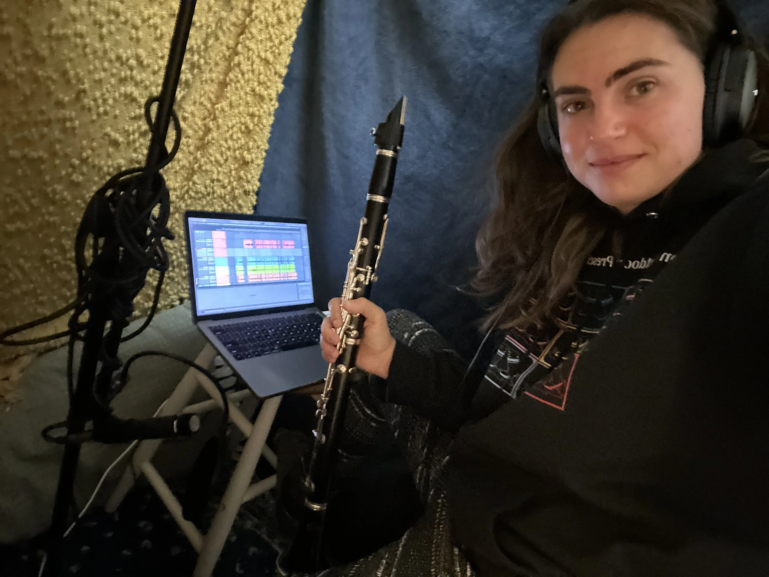 Isabel Shaye recording clarinet in home studio