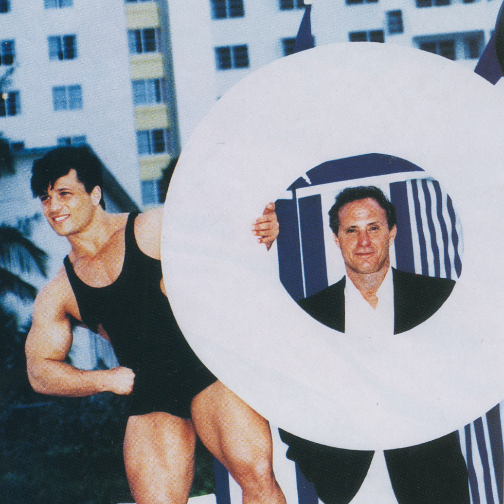 Woman in a black swimsuit posing outdoors with a paper cutout of a man in a tuxedo.