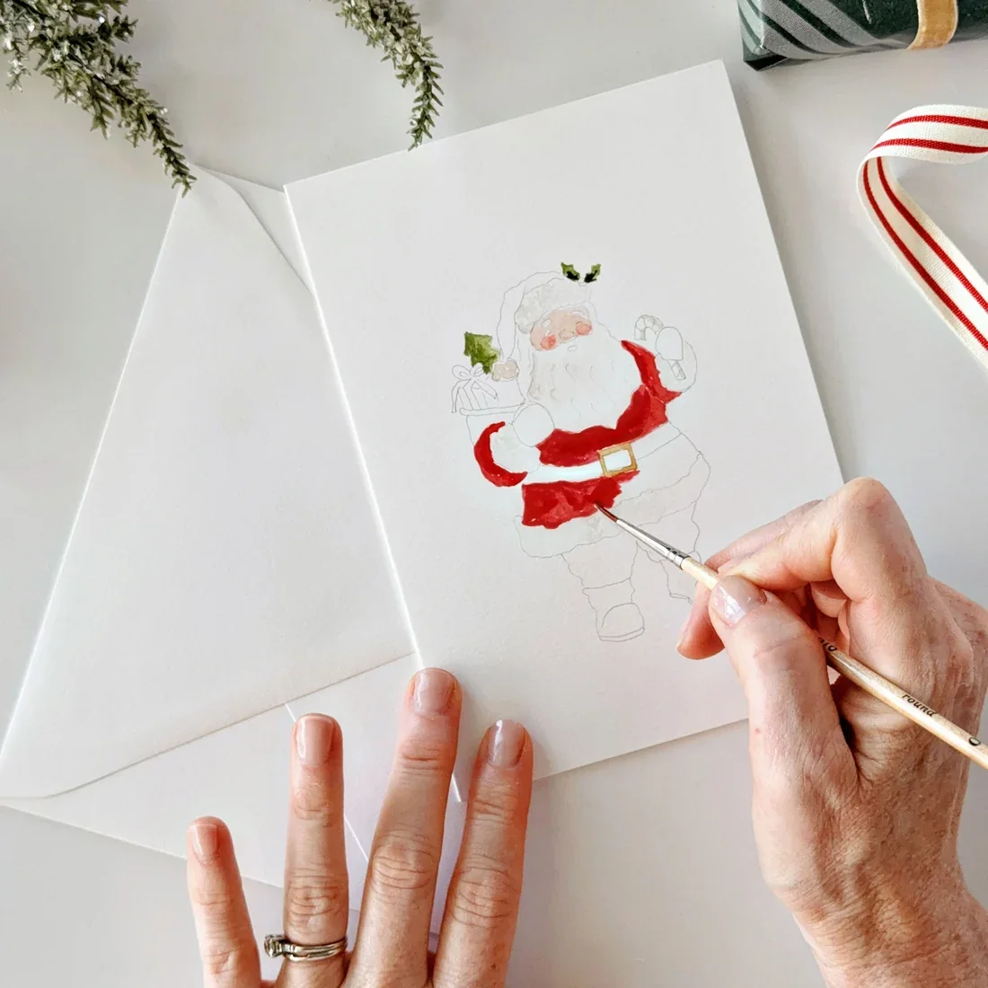 painting-santa_0a188d6c-f594-4df0-a011-fa19bc11a588.webp