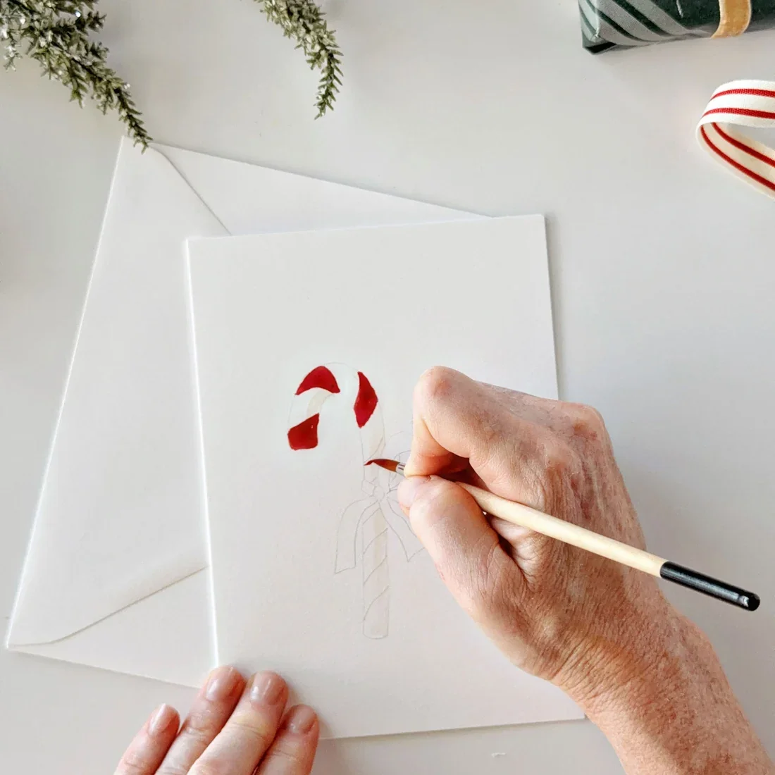painting-candy-cane_fae7e0db-4ca6-4add-bf9c-343546ff17a0.webp