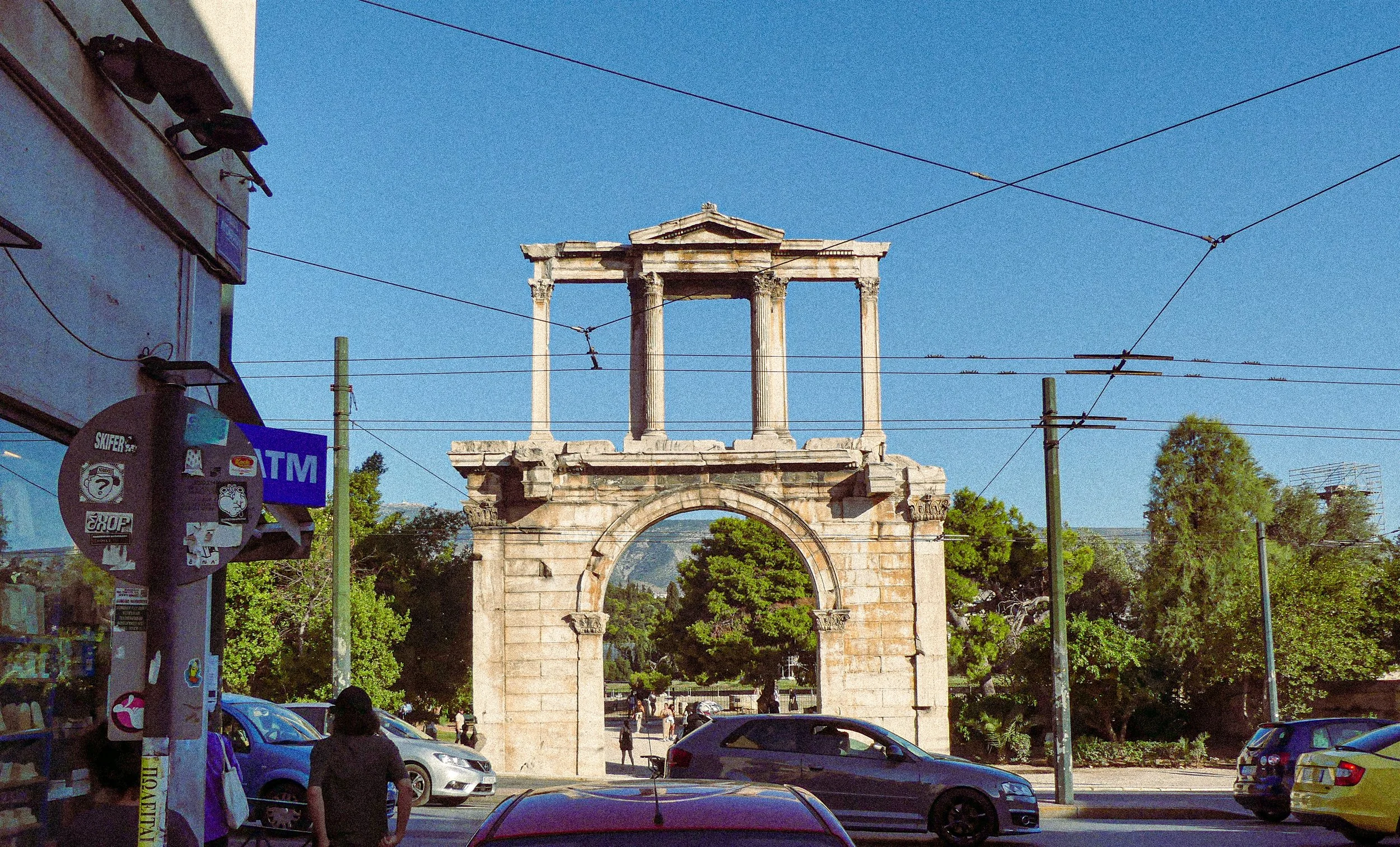 Ancient Grreek building amongst modern city-scape in Athens, Greece