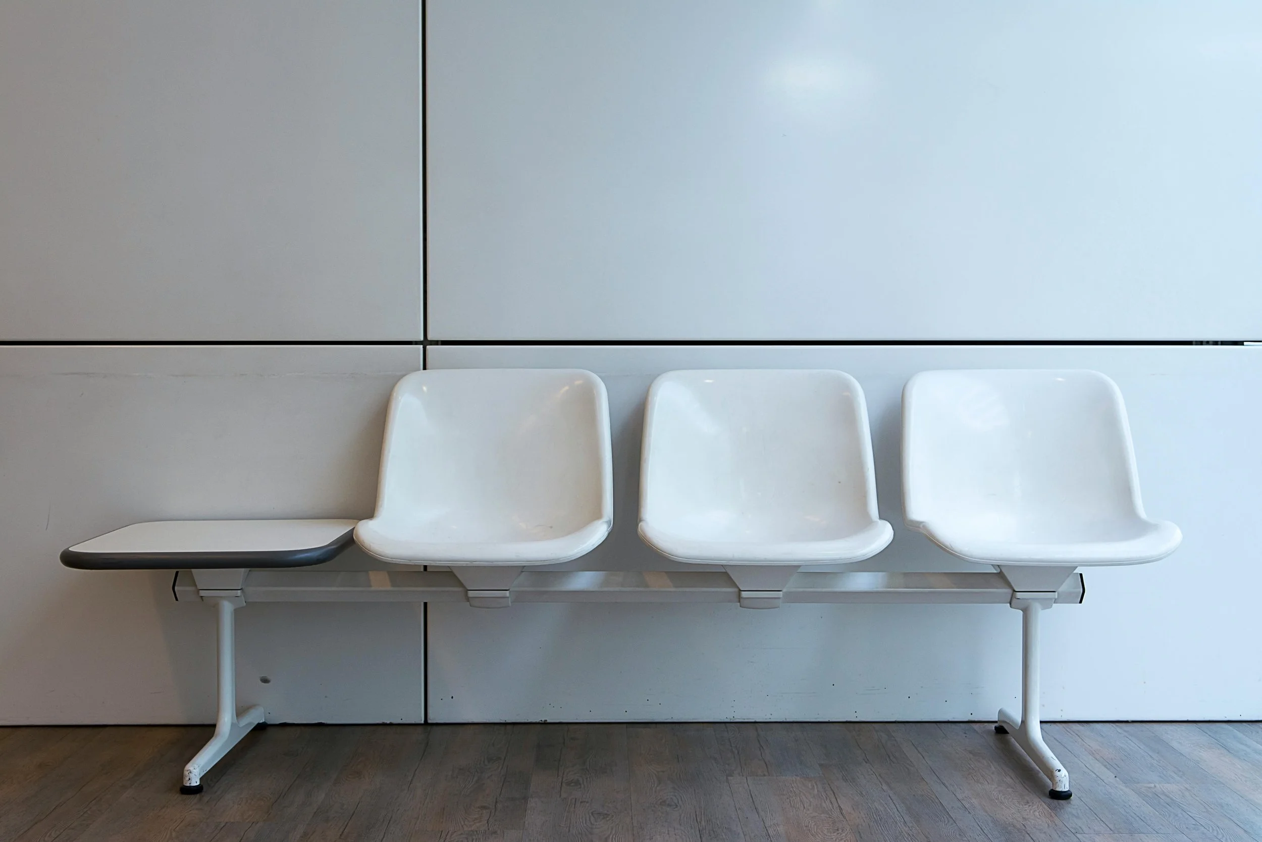 Photo by Jan van der Wolf: https://www.pexels.com/photo/chairs-in-corridor-9259472/