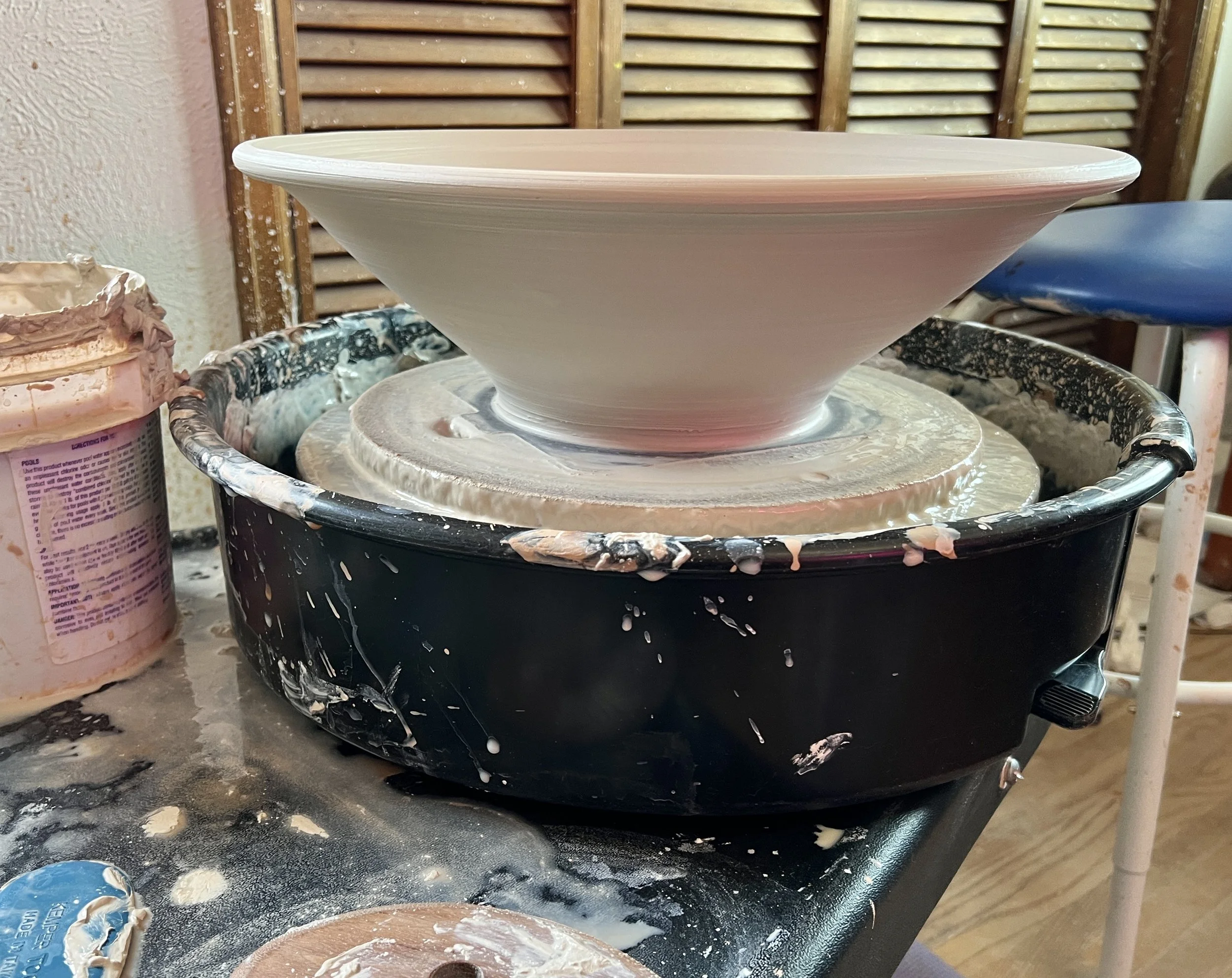 Large bowl on pottery wheel.