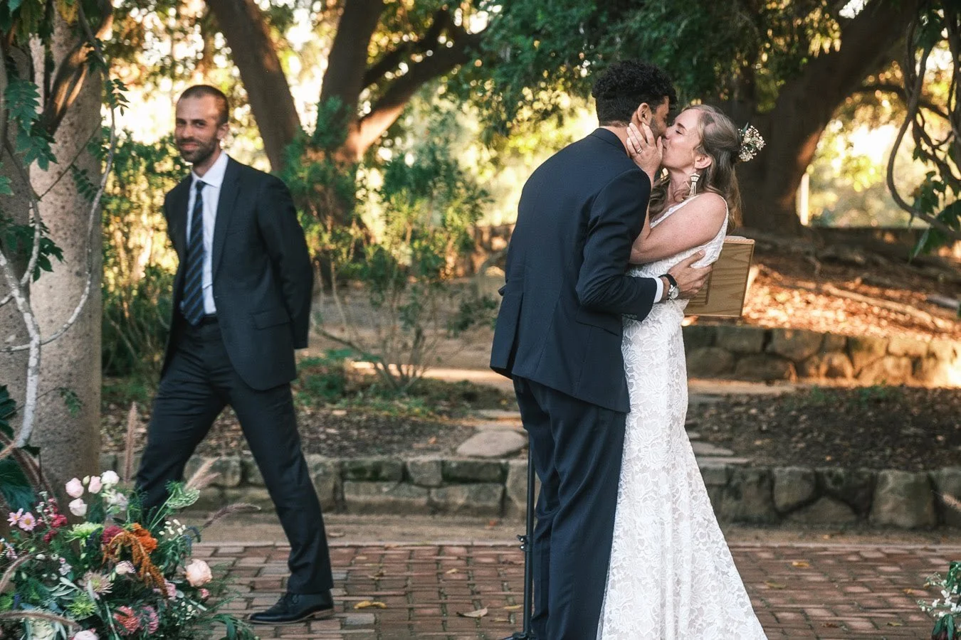 Couple kissing after saying "I Do". Full-service wedding planning and coordination by Santa Barbara wedding planners