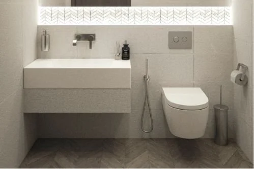 Minimalist bathroom with wall-mounted sink, faucet, soap dispenser, black bottle, wall-mounted toilet, toilet paper holder, and trash can.