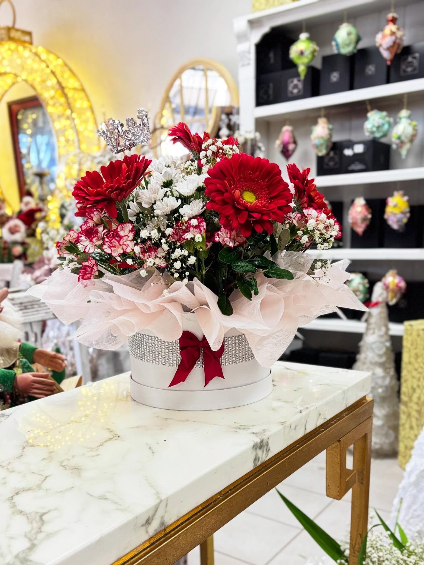 ✨ Celebrating 75 years of elegance ✨

This exquisite arrangement was designed for a truly classy lady&rsquo;s milestone birthday. Featuring bold red gerberas, delicate white daisies, and soft accents of baby&rsquo;s breath, it radiates timeless beaut