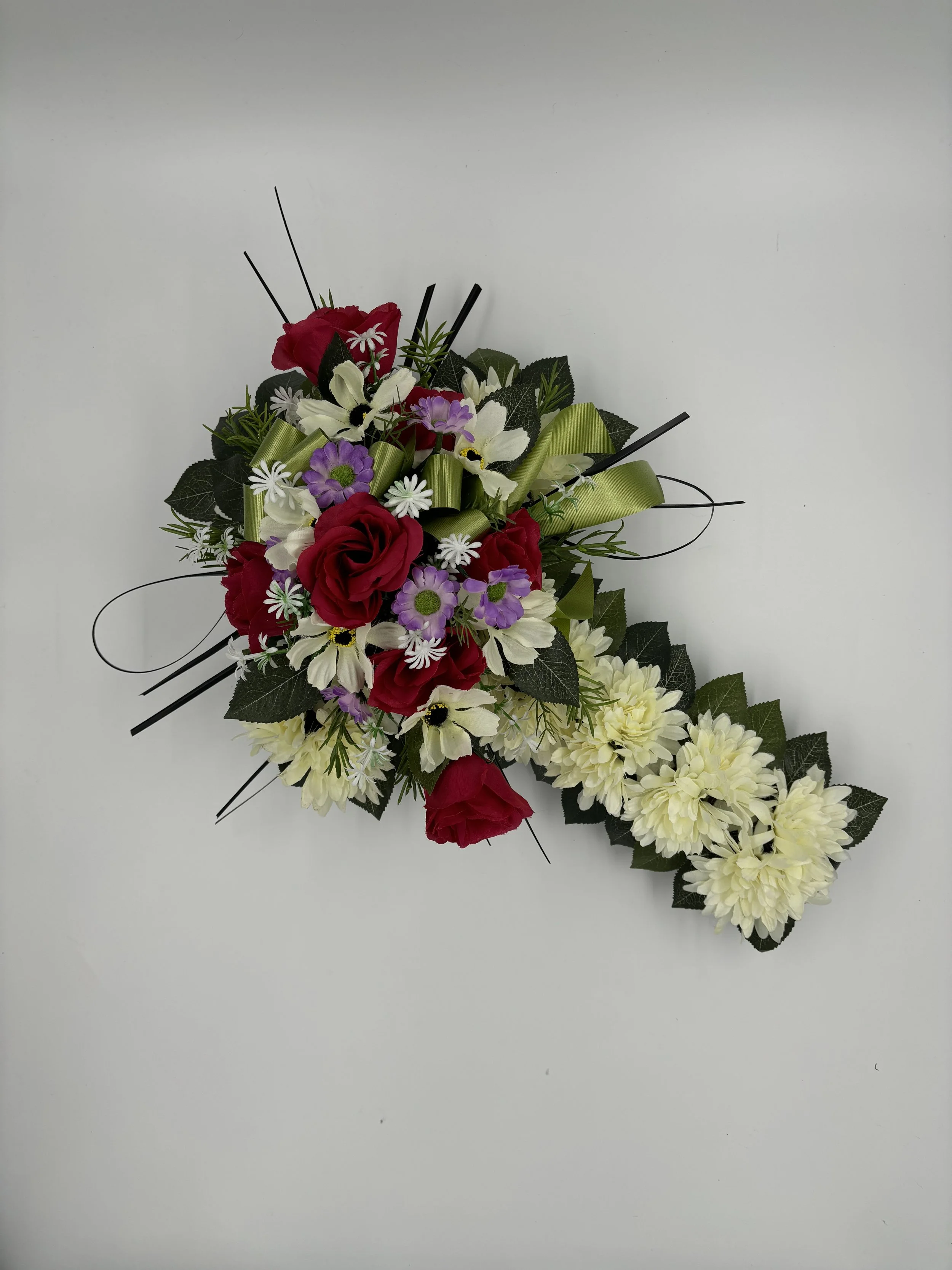 FUNERAL CROSS TRIBUTE
Cross Tribute with Chrysanthemums, Red Roses & Daisies
This Elegant Floral Cross is carefully arranged with white chrysanthemums, red roses, and soft white daisies — a heartfelt tribute to honour a loved one. A meaningful gestur