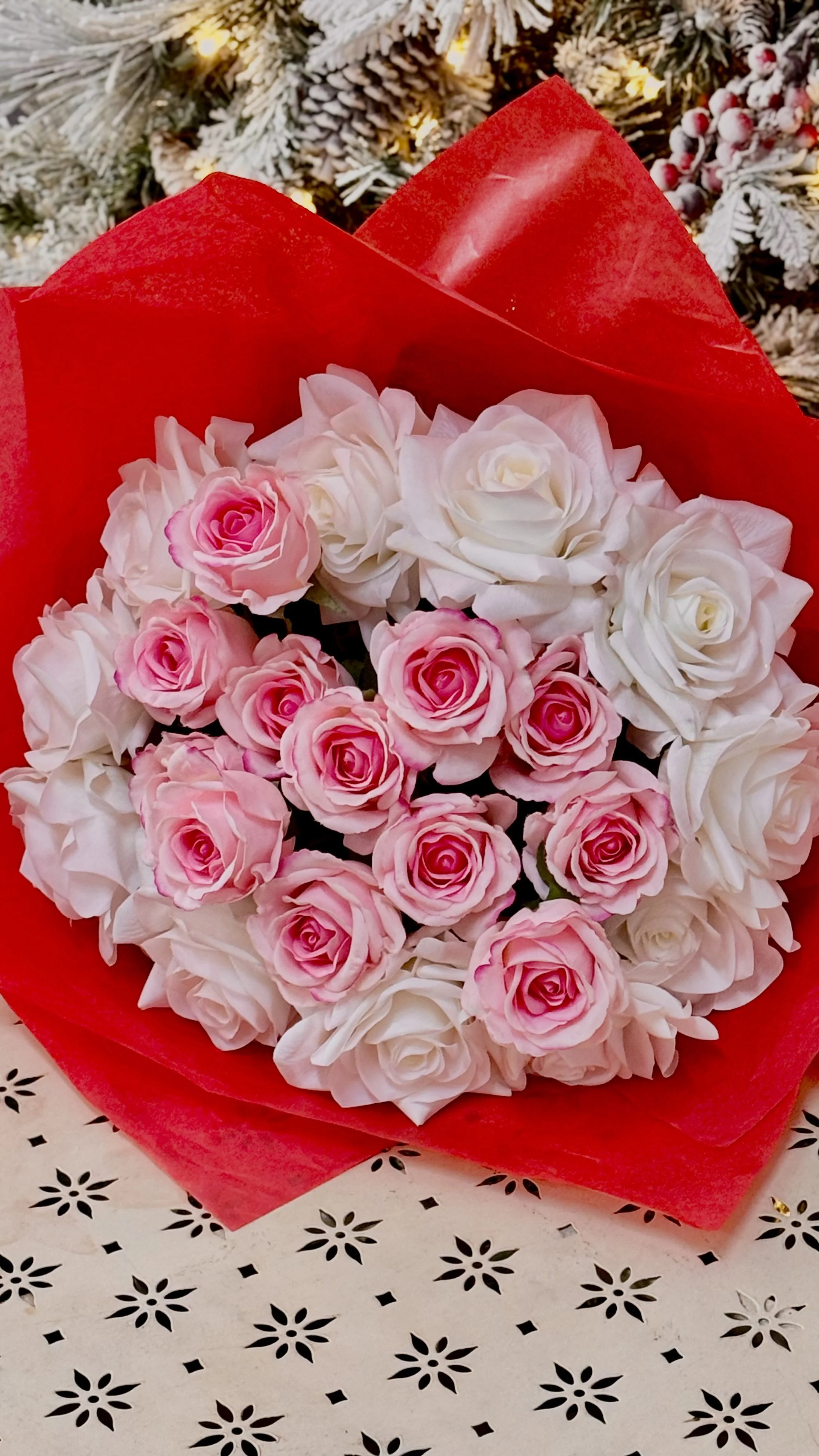 ELEGANCE IN BLOOM
Luxurious Bouquet of white and blush pink roses wrapped in vibrant red tissue, styled for love and romance, handcrafted by The Bouquet Bar Adelaide. (Click on Image to Enquire.)