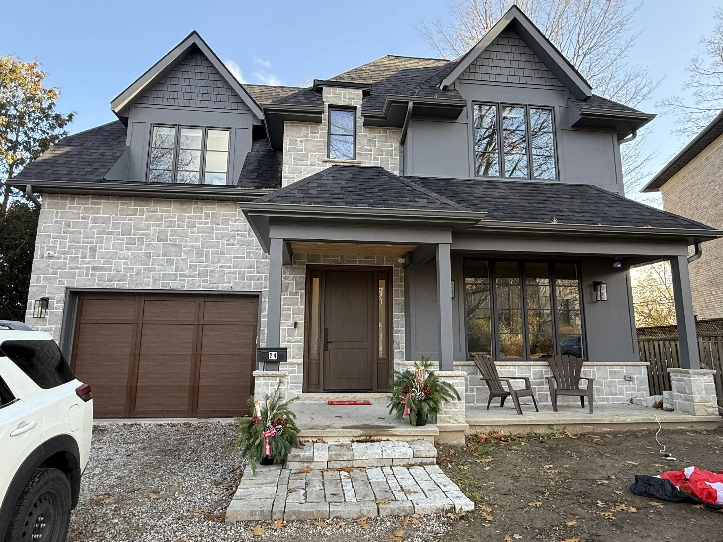home exterior in dark & wood