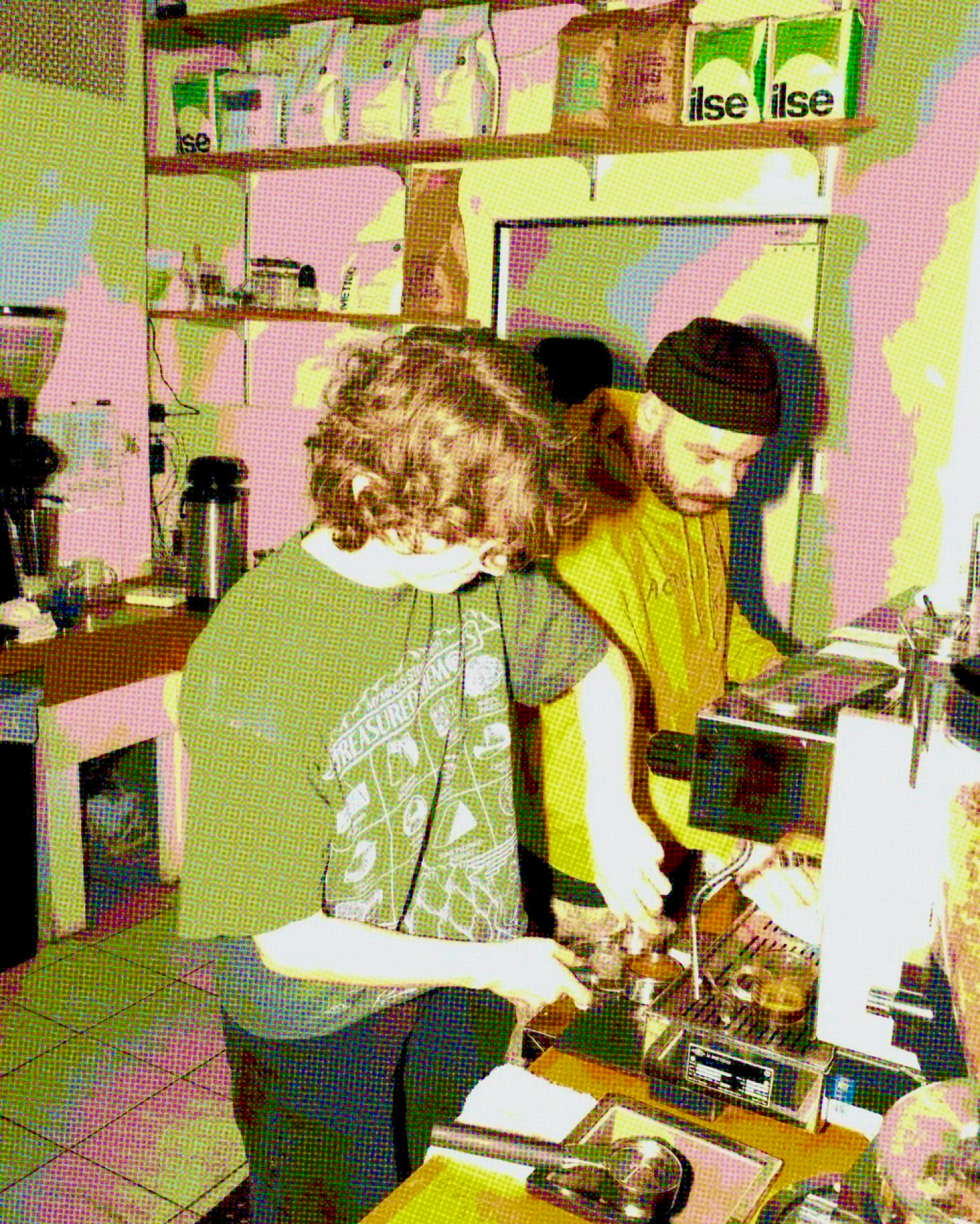 Two baristas preparing espresso beverages at Candor, an independent coffee shop in Wicker Park, Chicago.