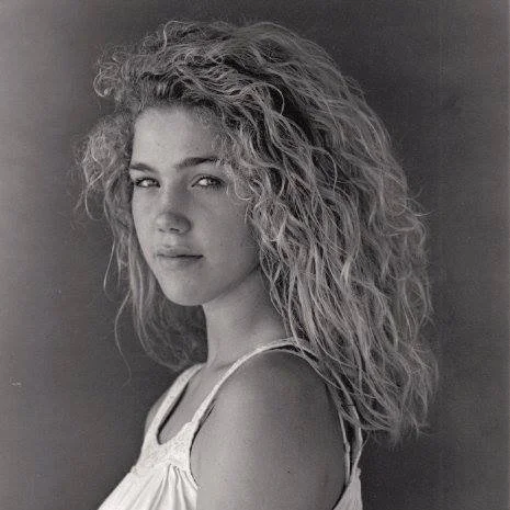 an image of amy wall as a teenager in black and white