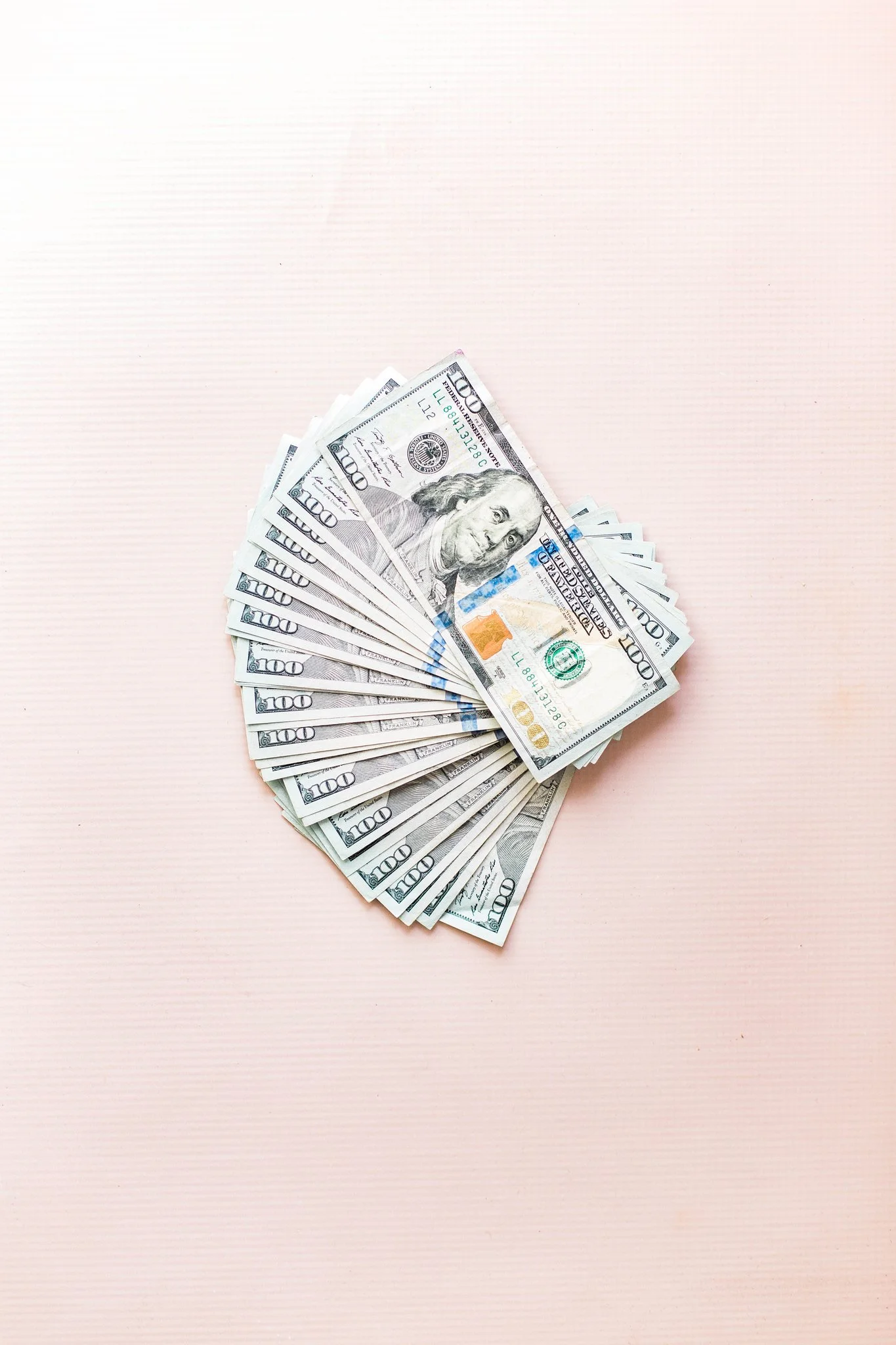 an image of hundred dollars bills representing revenue